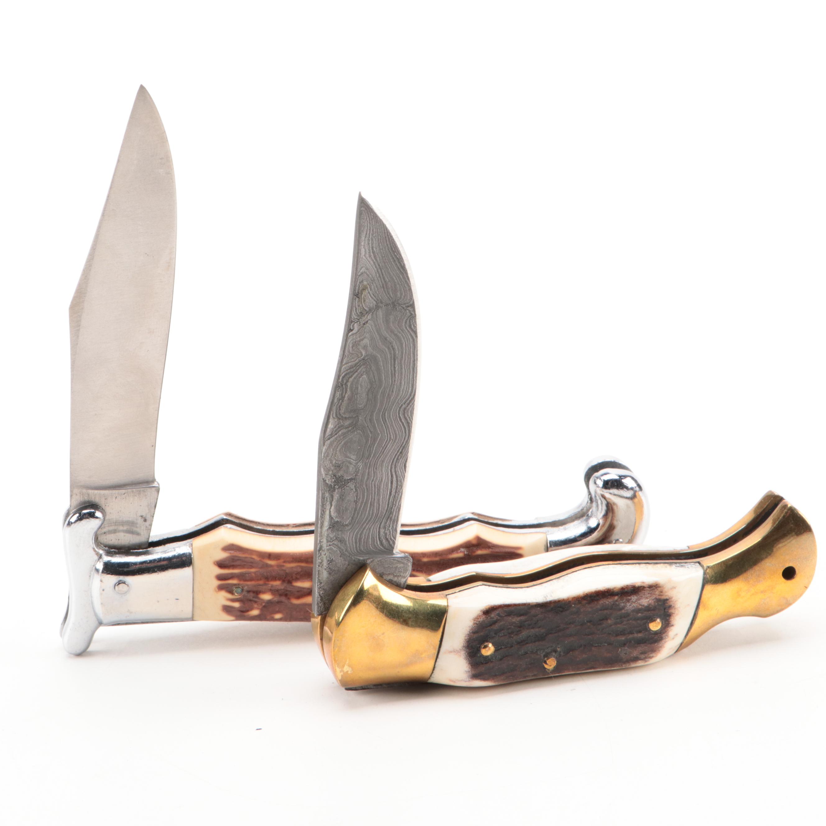 Damascus and Stainless Steel Pocket Knives with Stag Handles