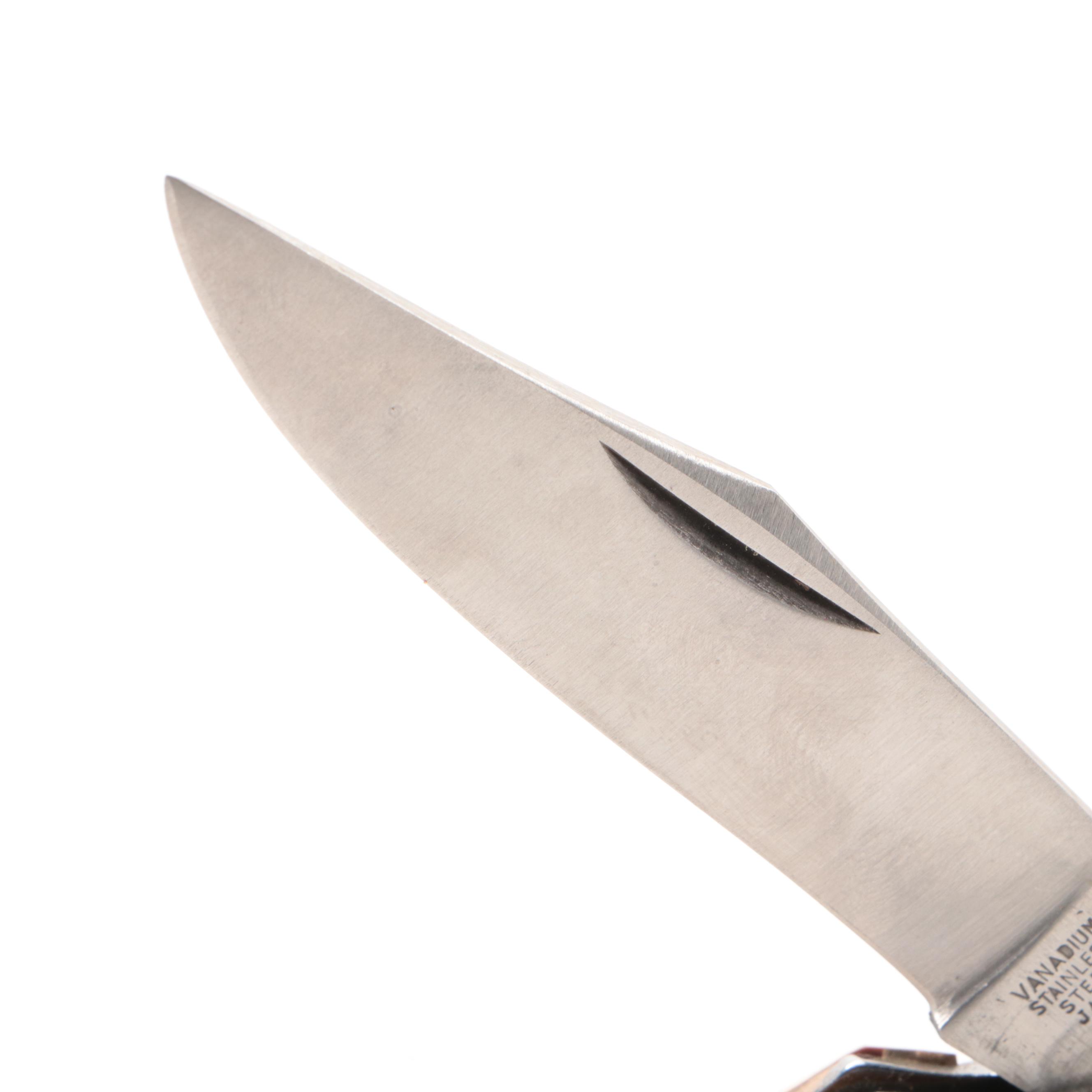 Damascus and Stainless Steel Pocket Knives with Stag Handles