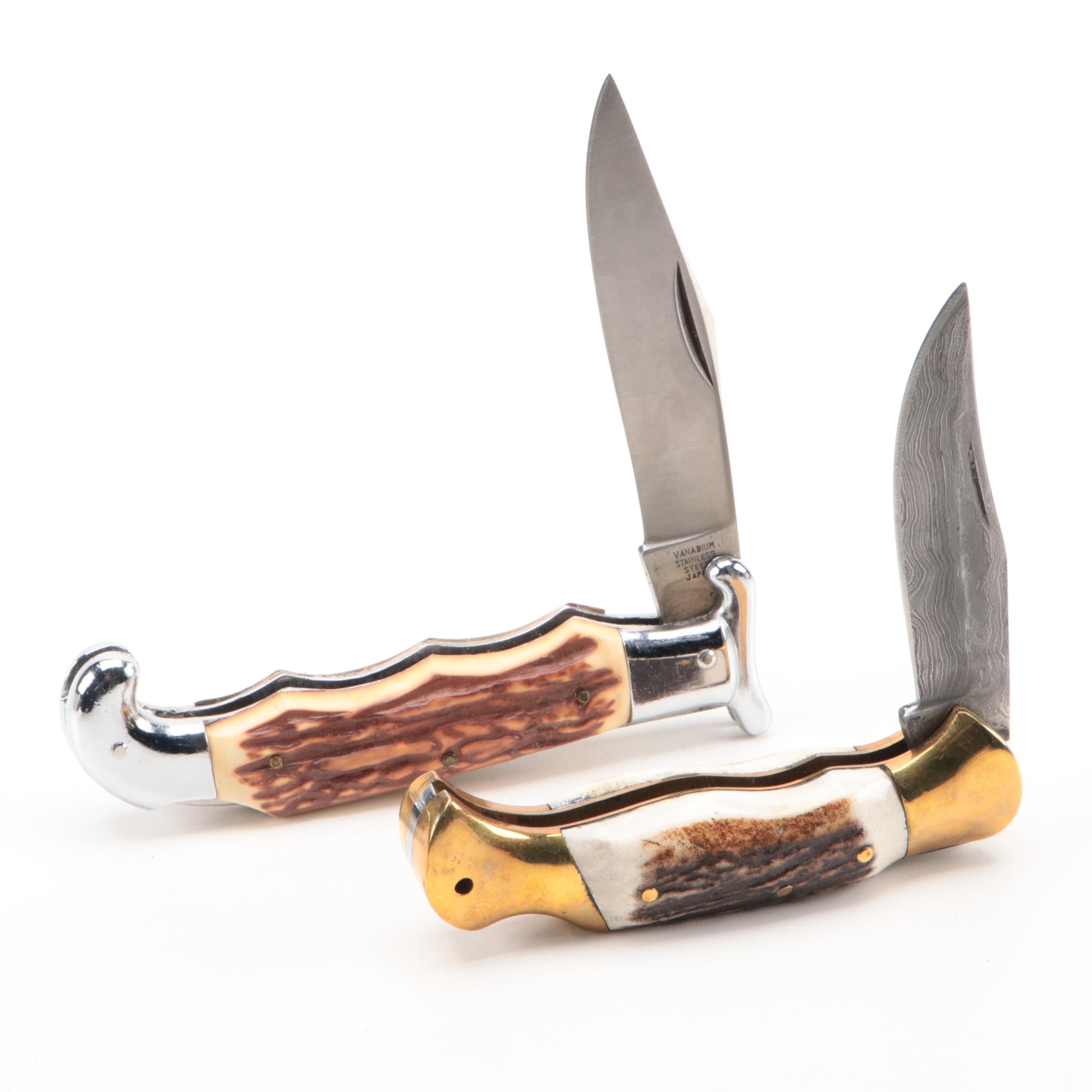 Damascus and Stainless Steel Pocket Knives with Stag Handles
