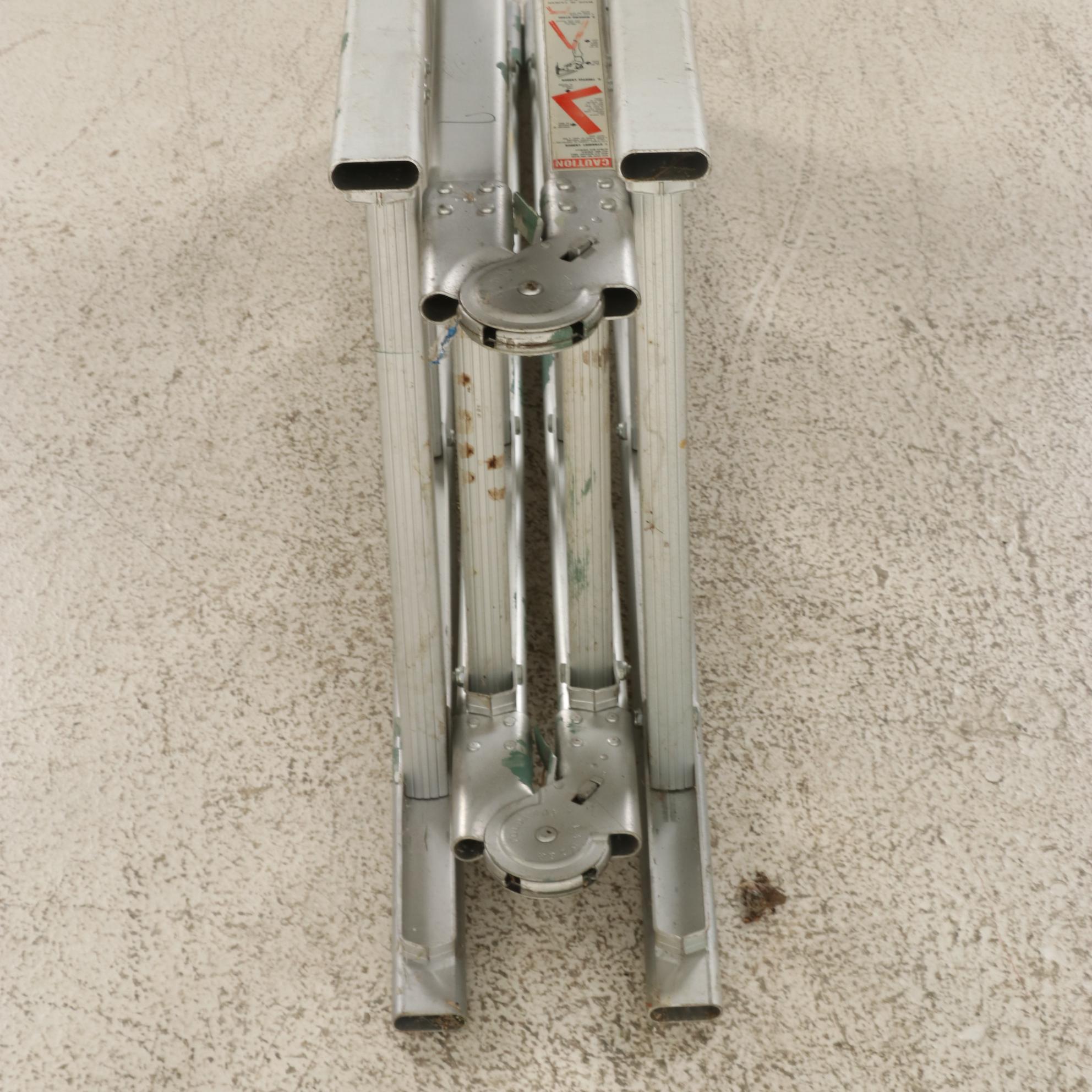 Ladder with Suncast Outdoor Tool Storage Trunk