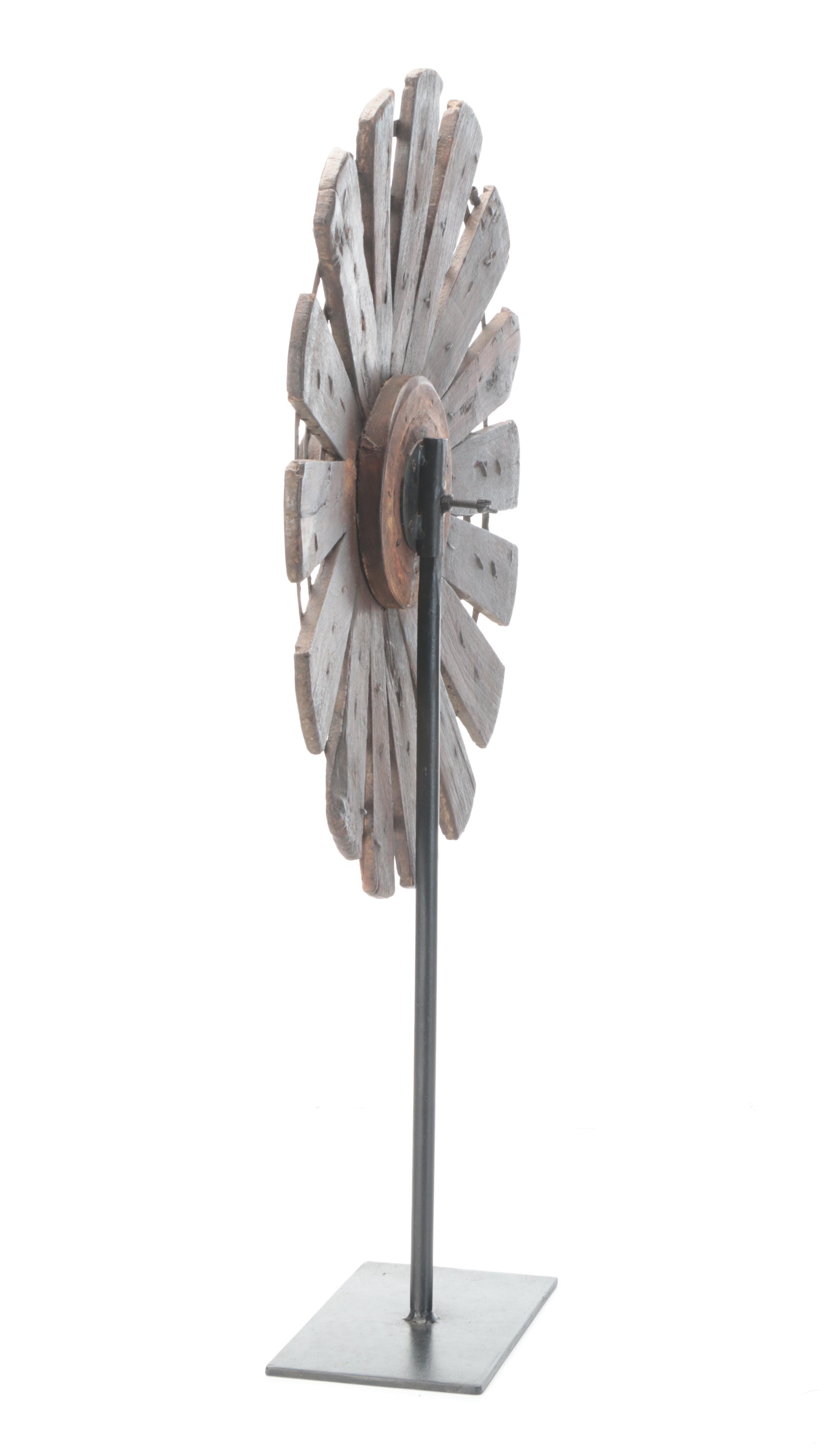Indian Spinning Wheel Mounted on a Display Stand