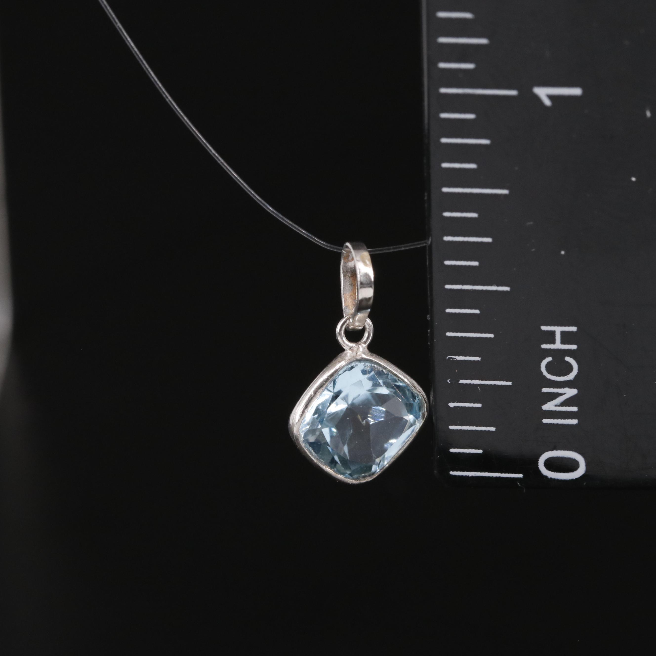 14K Blue Topaz Pendant