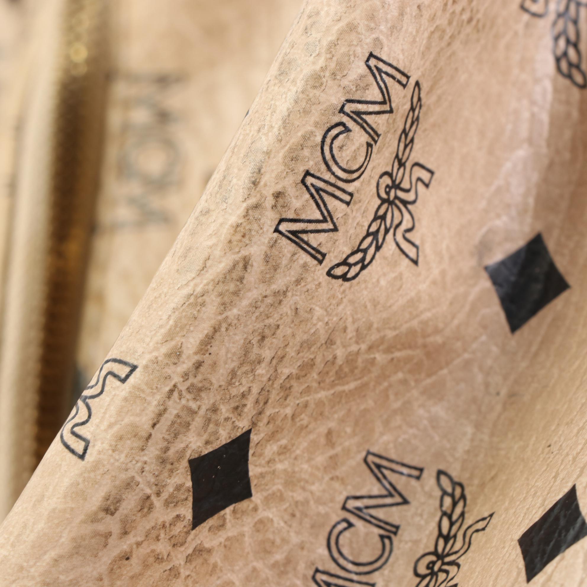 MCM Small Stark Backpack in Beige Studded Visetos