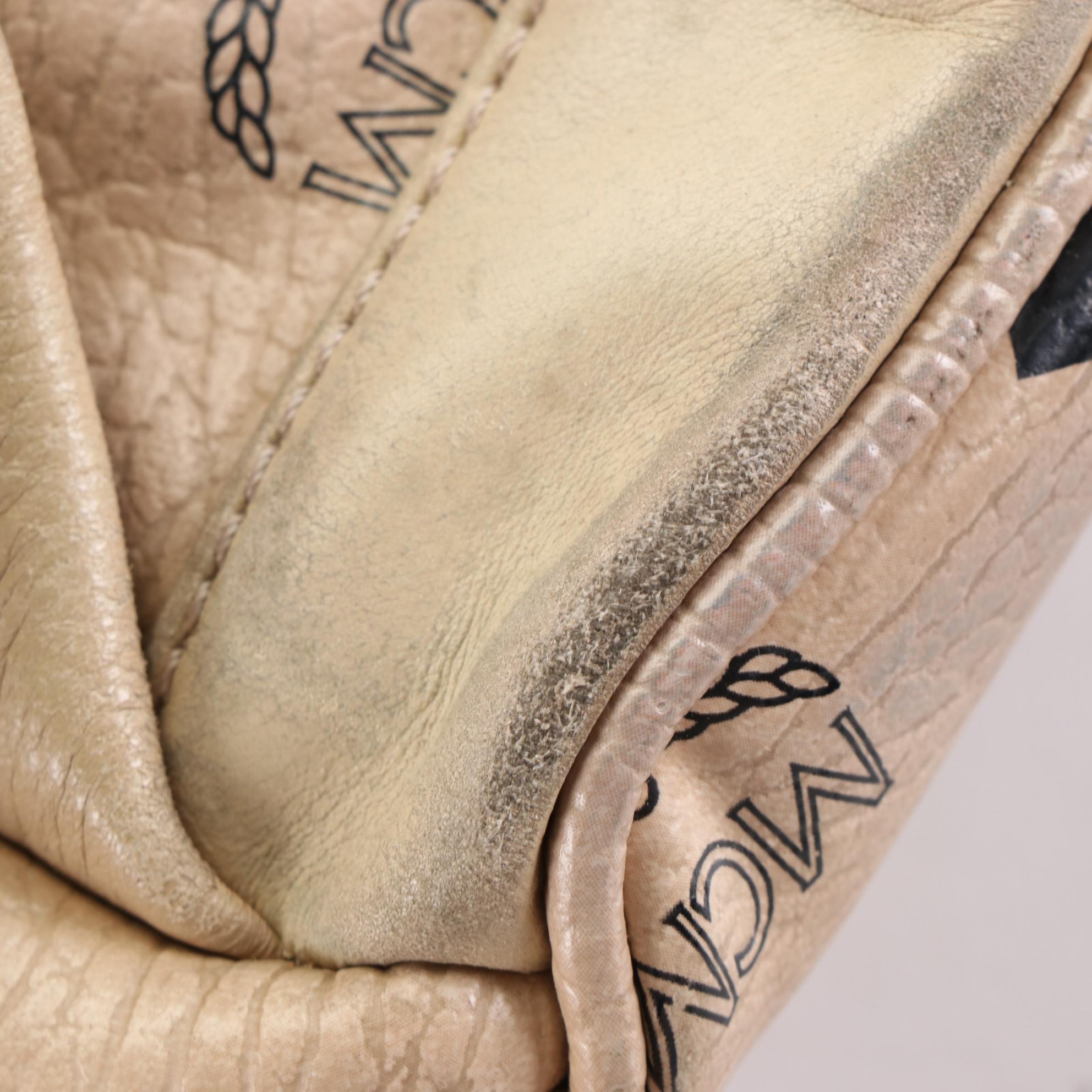 MCM Small Stark Backpack in Beige Studded Visetos