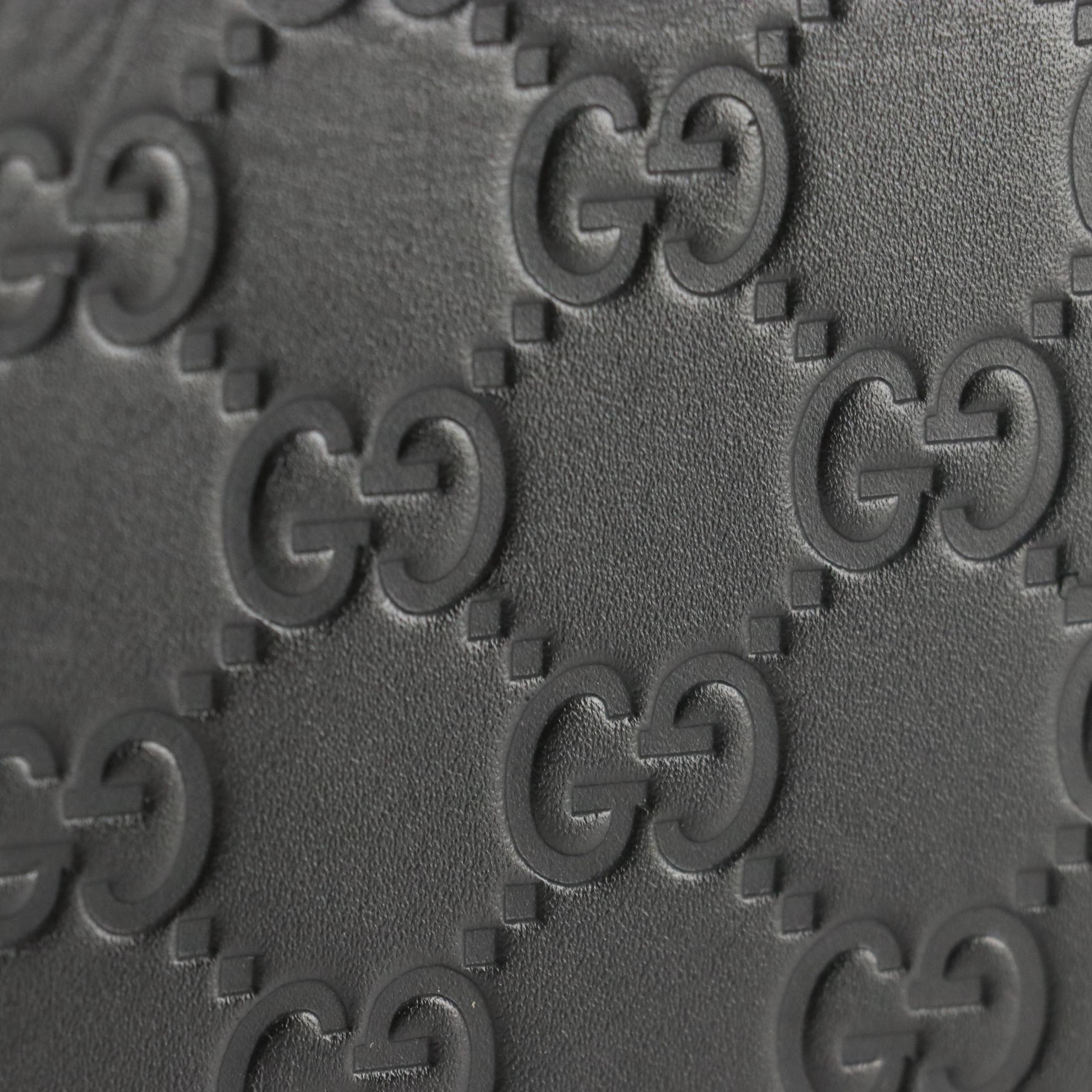 Gucci Checkbook Wallet in GG Embossed Leather