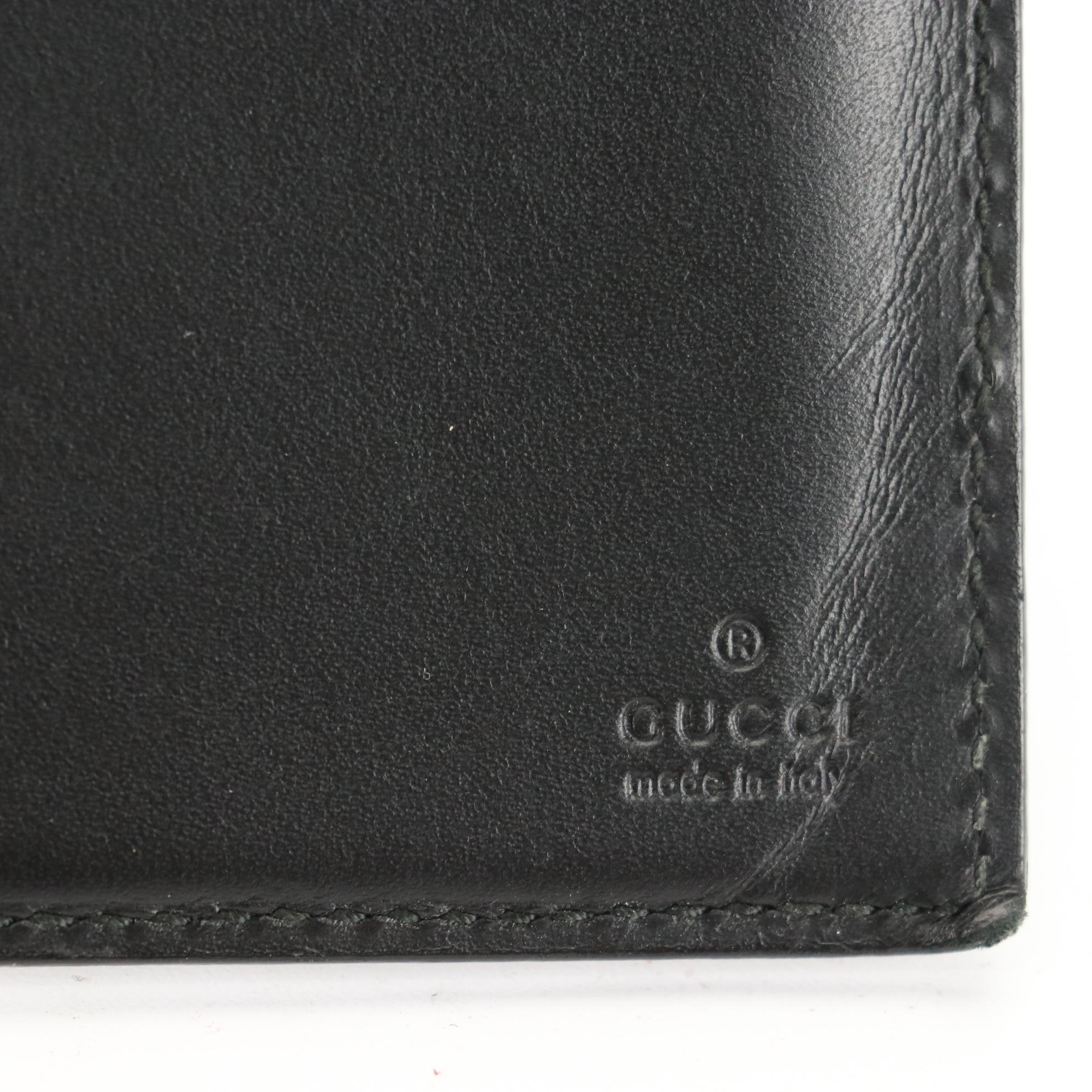 Gucci Checkbook Wallet in GG Embossed Leather