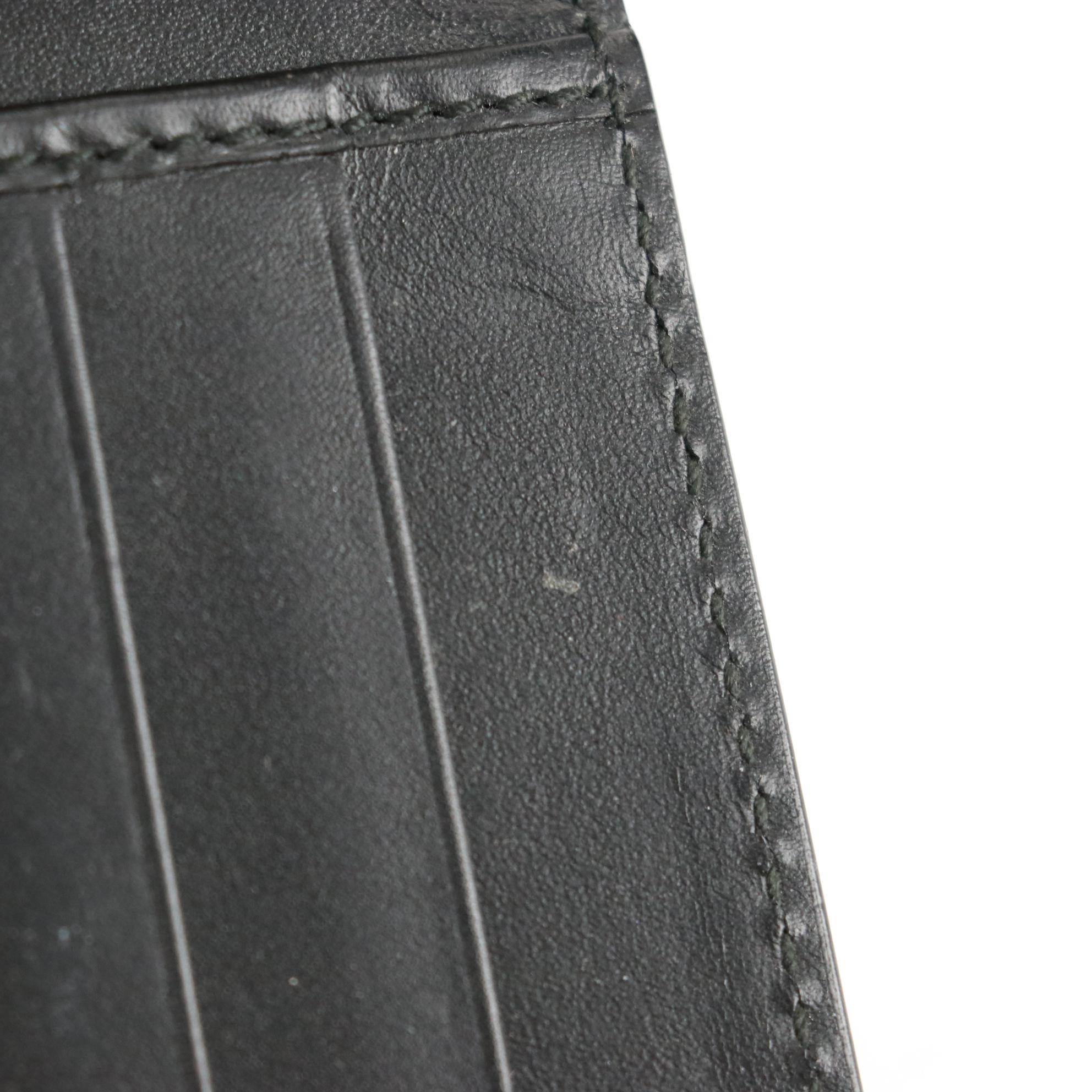 Gucci Checkbook Wallet in GG Embossed Leather