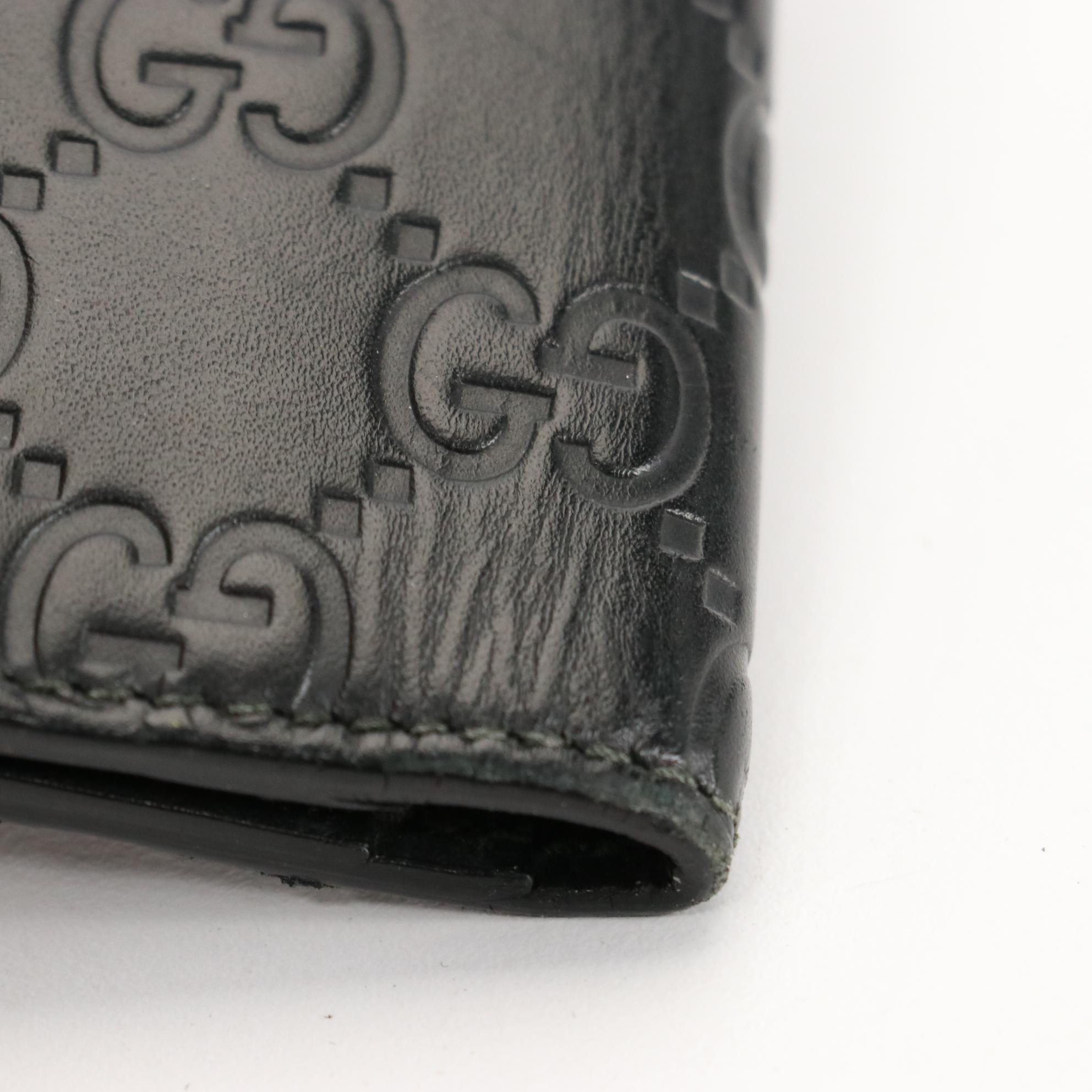 Gucci Checkbook Wallet in GG Embossed Leather