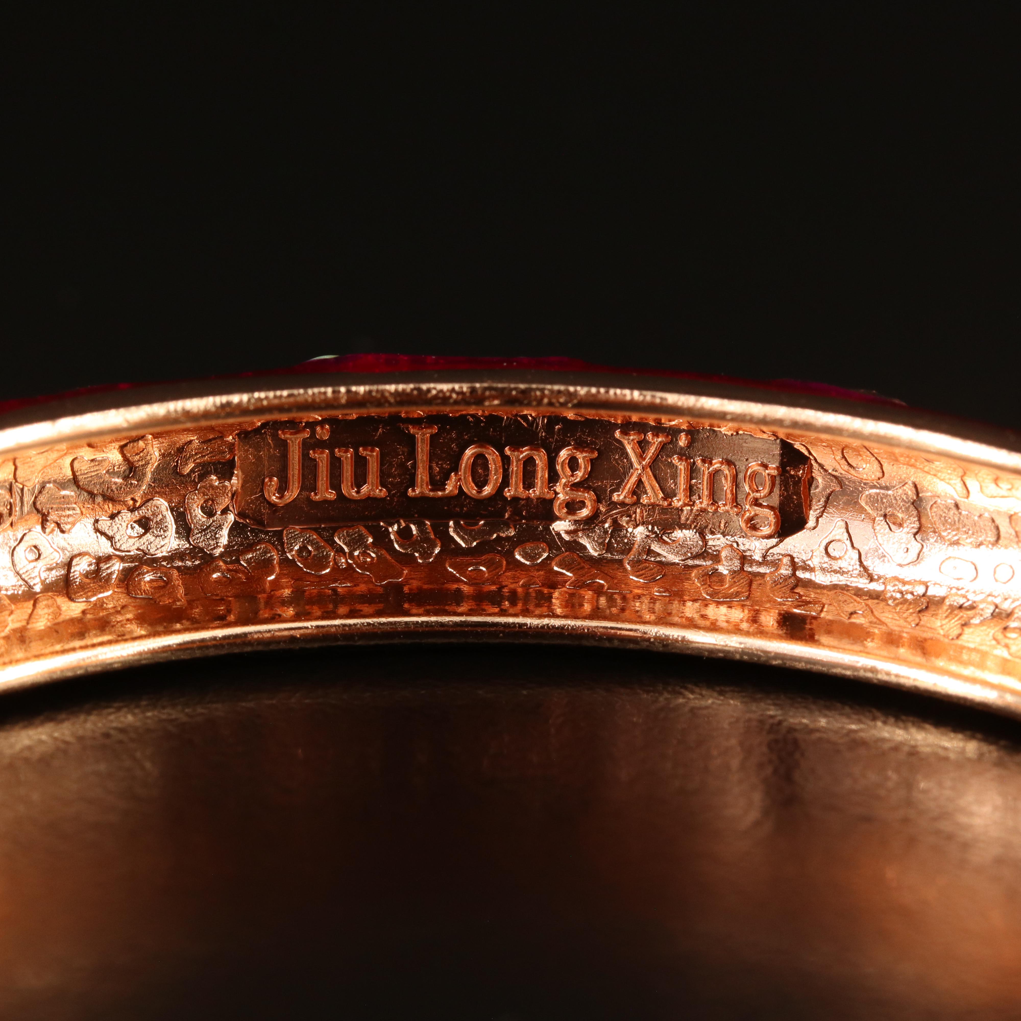Jiu Long Xing Featured in Enamel and Rhinestone Bangle Collection