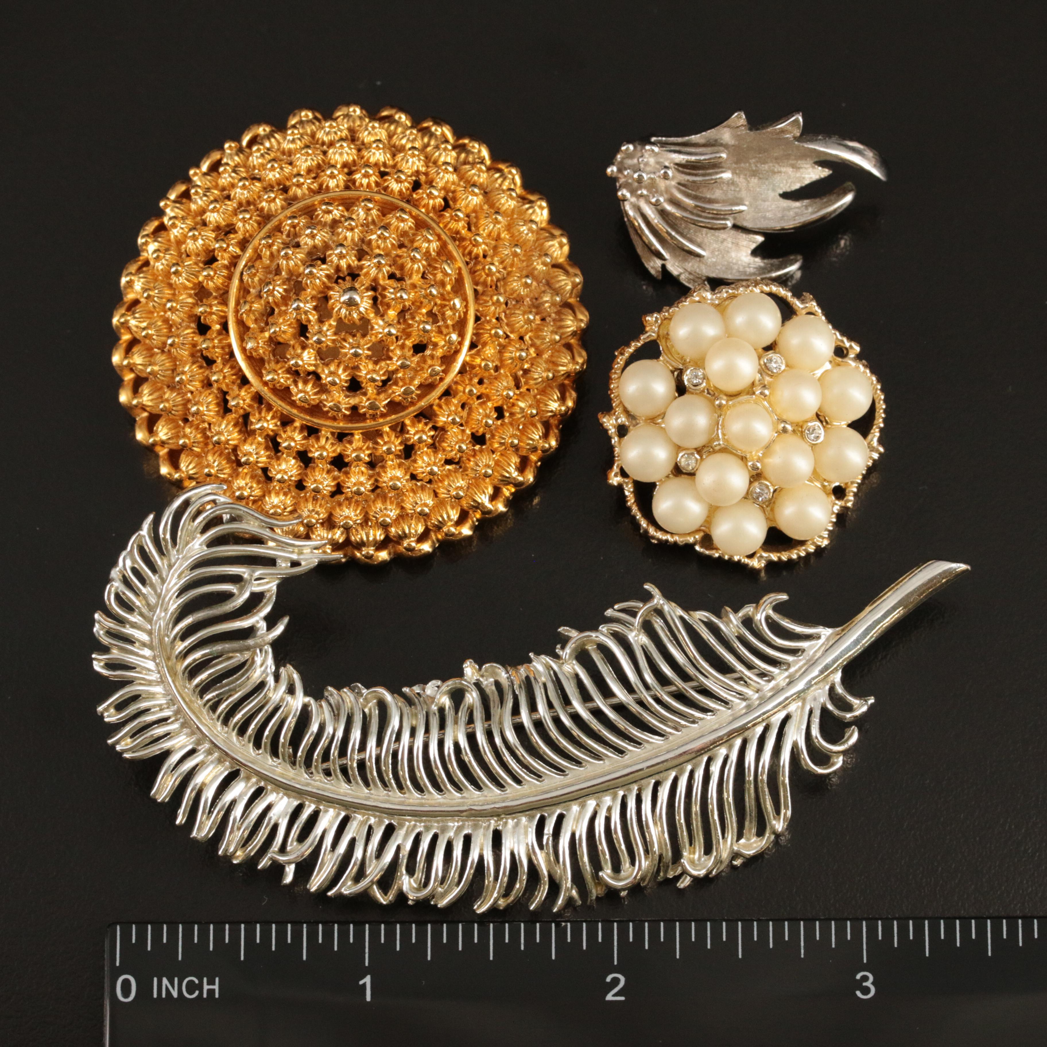 Faux Pearl Featured in Earring and Brooch Collection