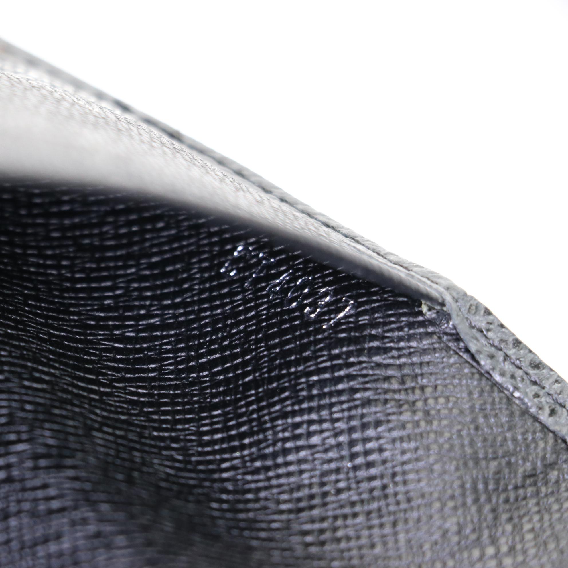 Louis Vuitton Porte-Cartes Crédit Yen Long Wallet in Taïga Leather