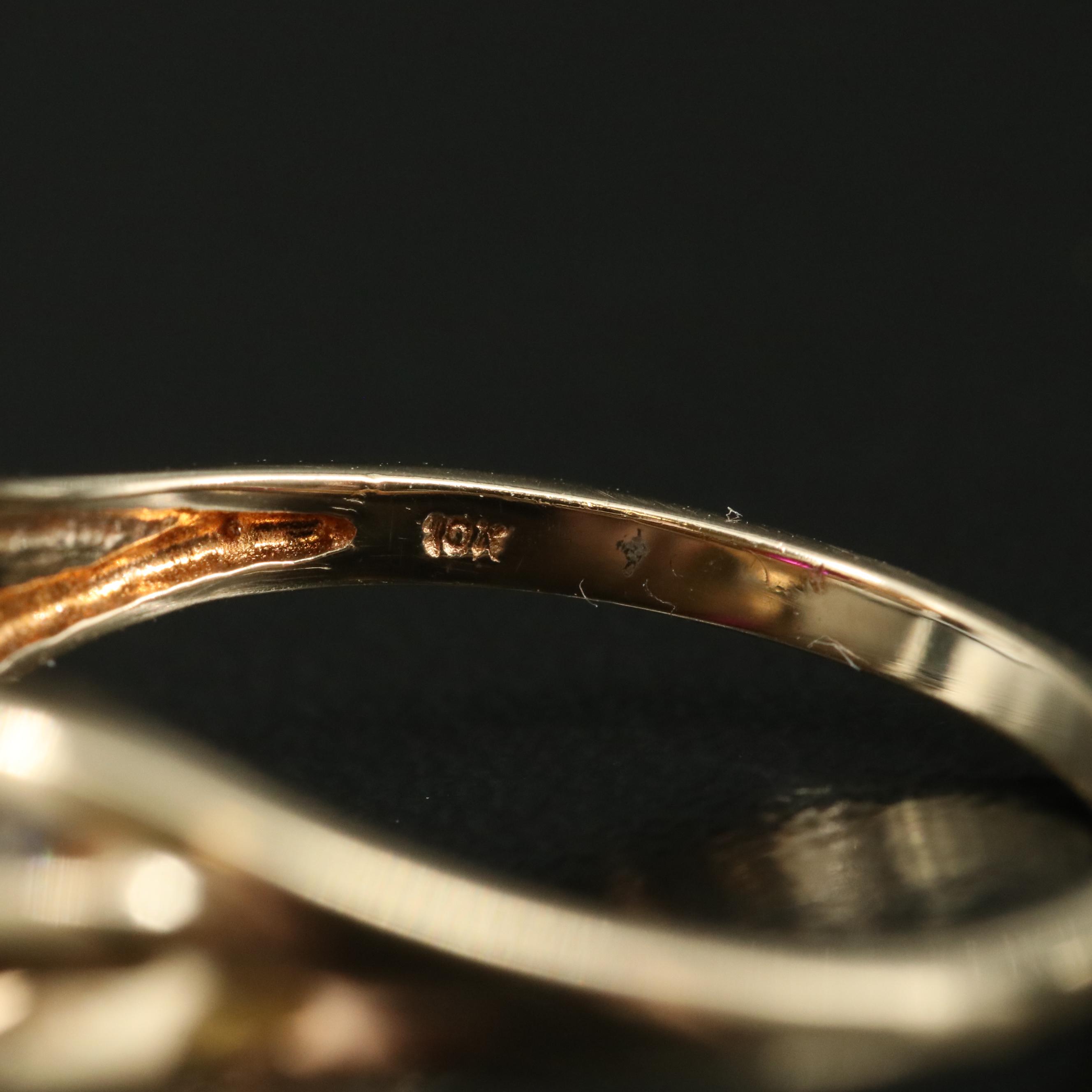 10K Ruby and Diamond Ribbon Ring