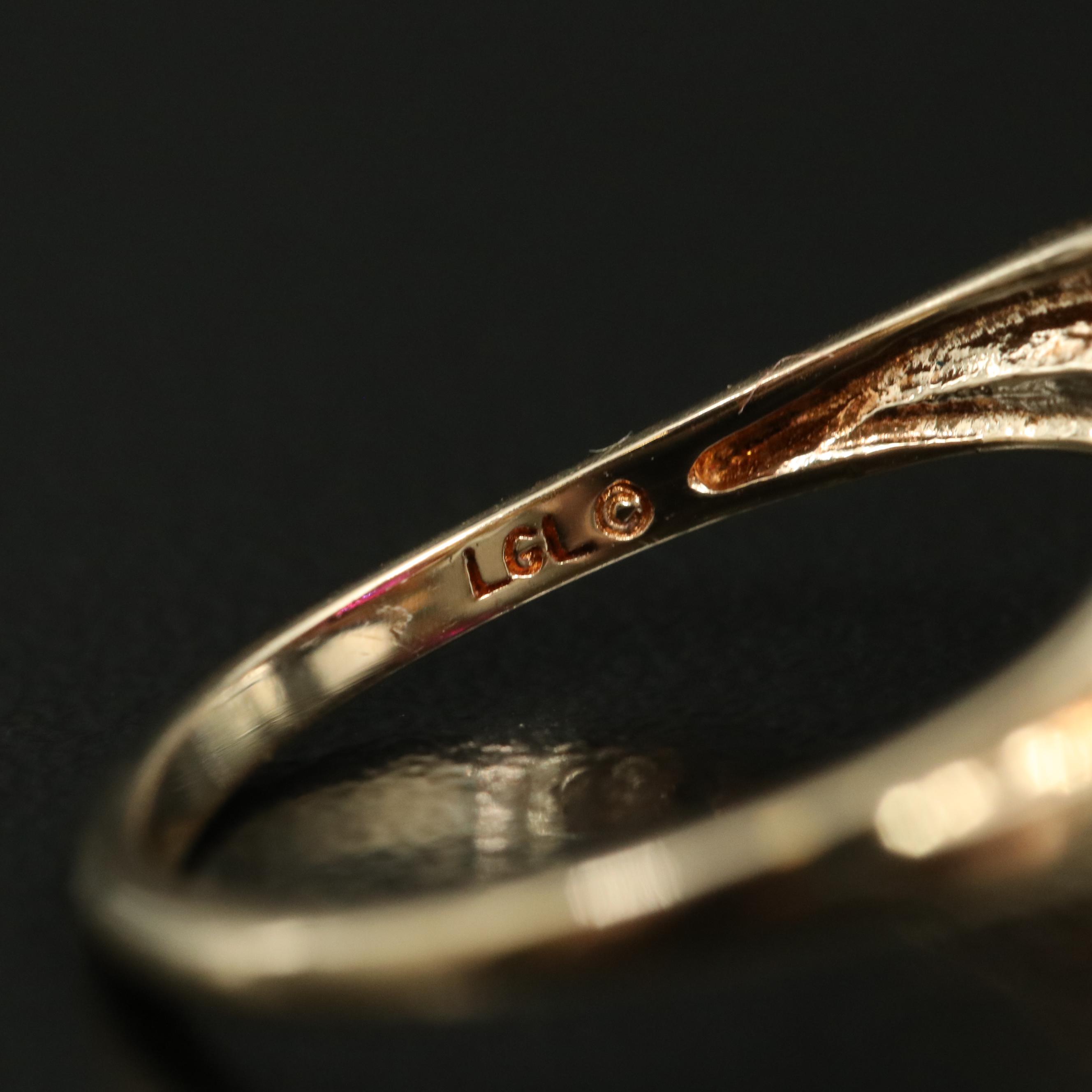 10K Ruby and Diamond Ribbon Ring