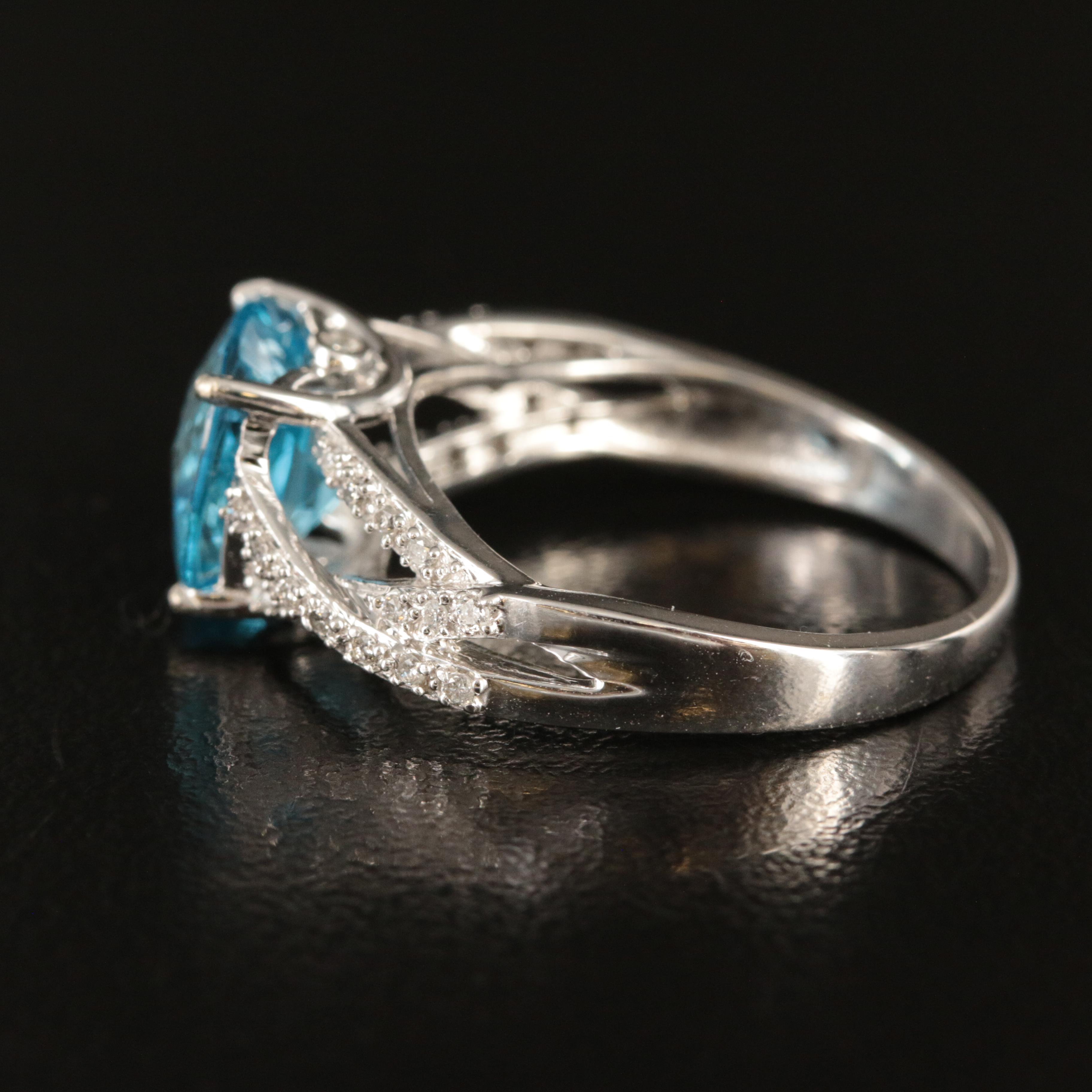 14K Swiss Blue Topaz and Diamond Ring