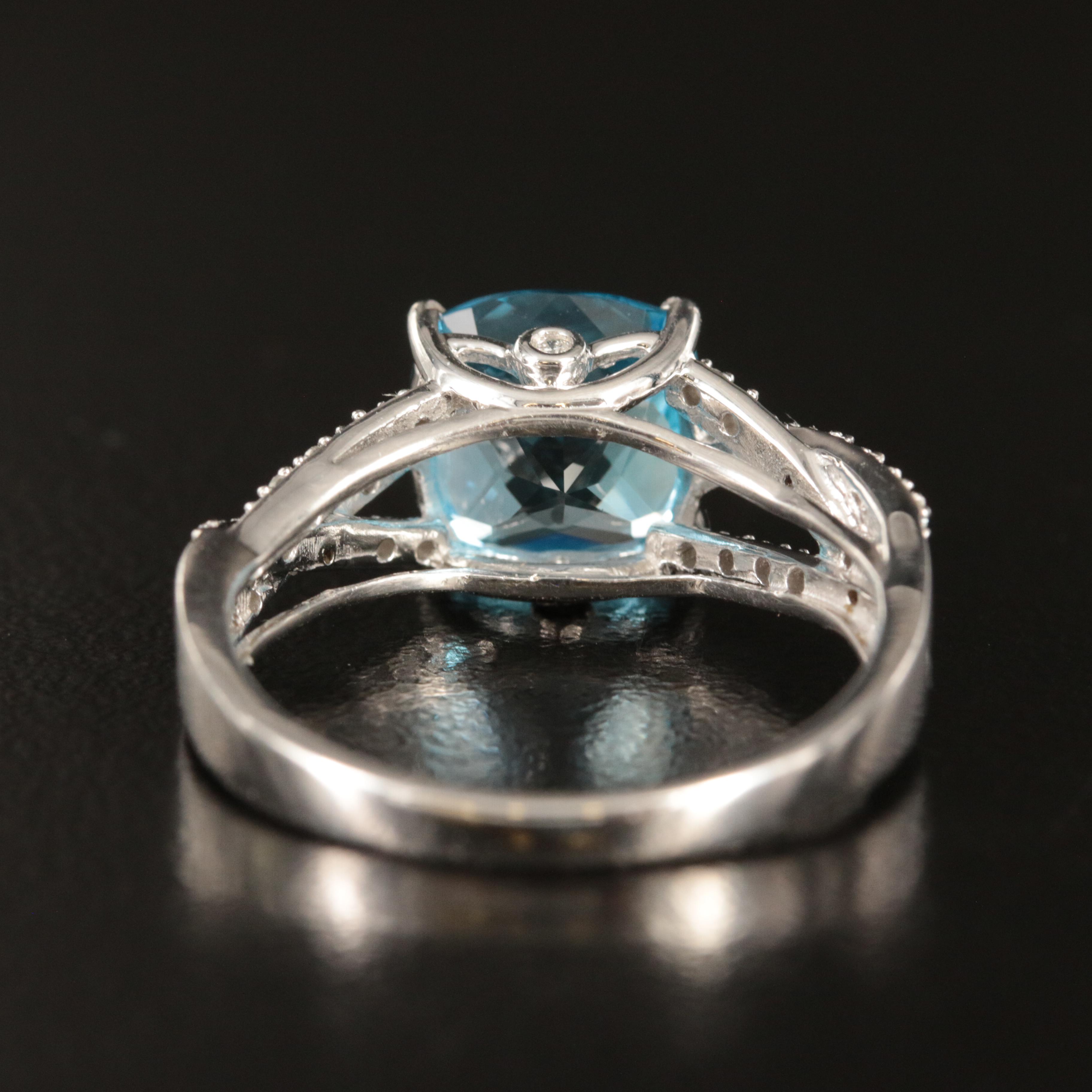 14K Swiss Blue Topaz and Diamond Ring