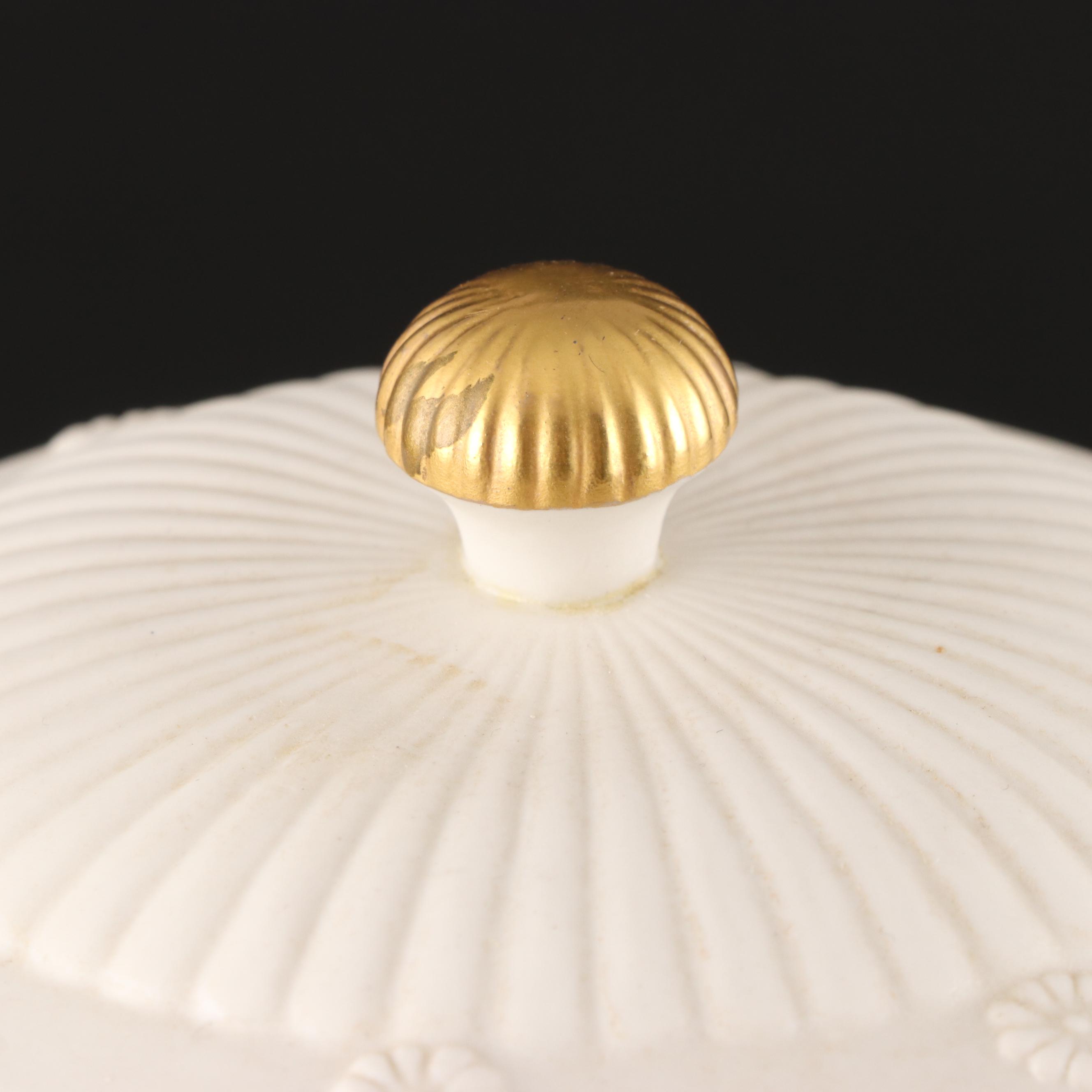 Pair of Italian Neoclassical Style Relief Bisque Porcelain Urns, Mid-20th C.