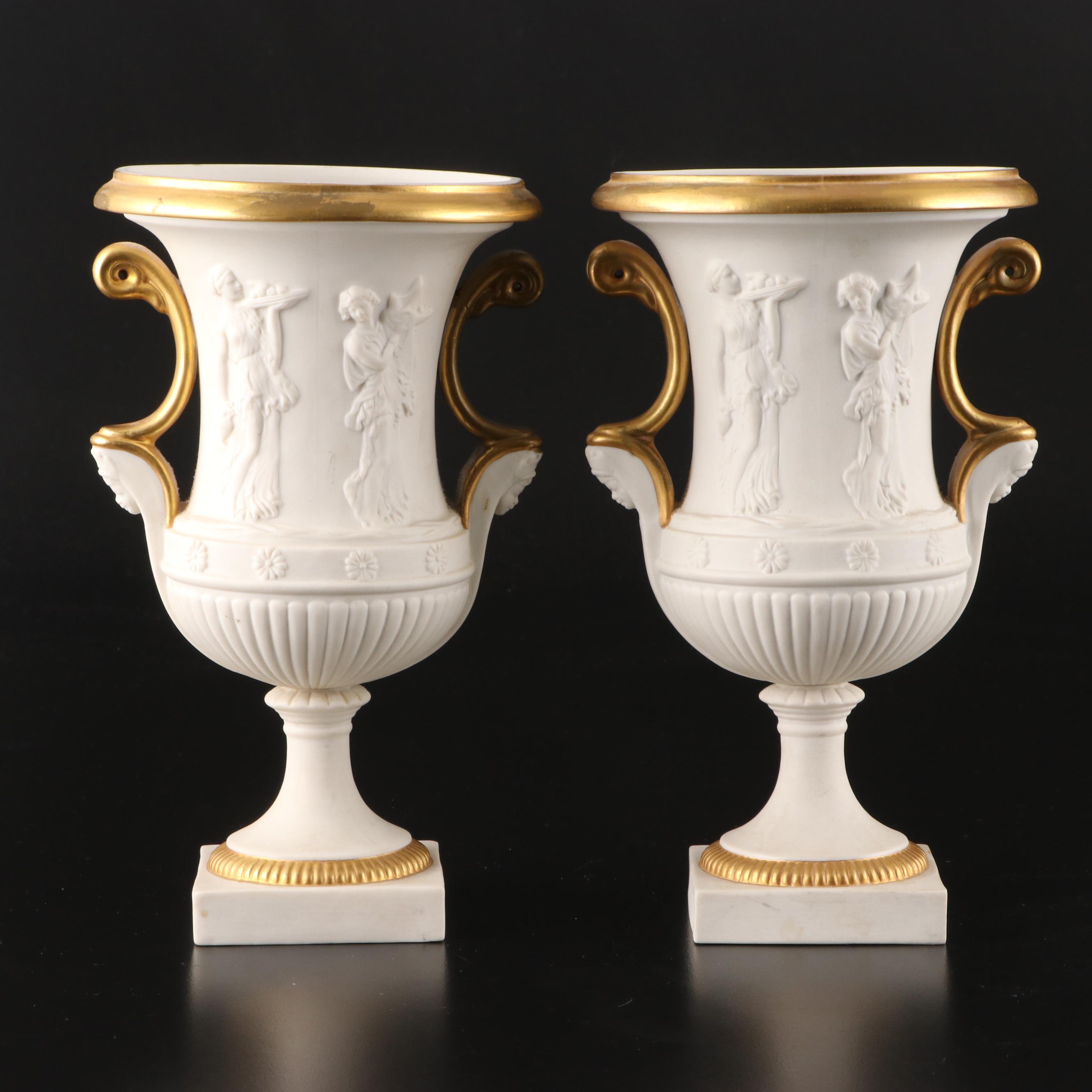 Pair of Italian Neoclassical Style Relief Bisque Porcelain Urns, Mid-20th C.