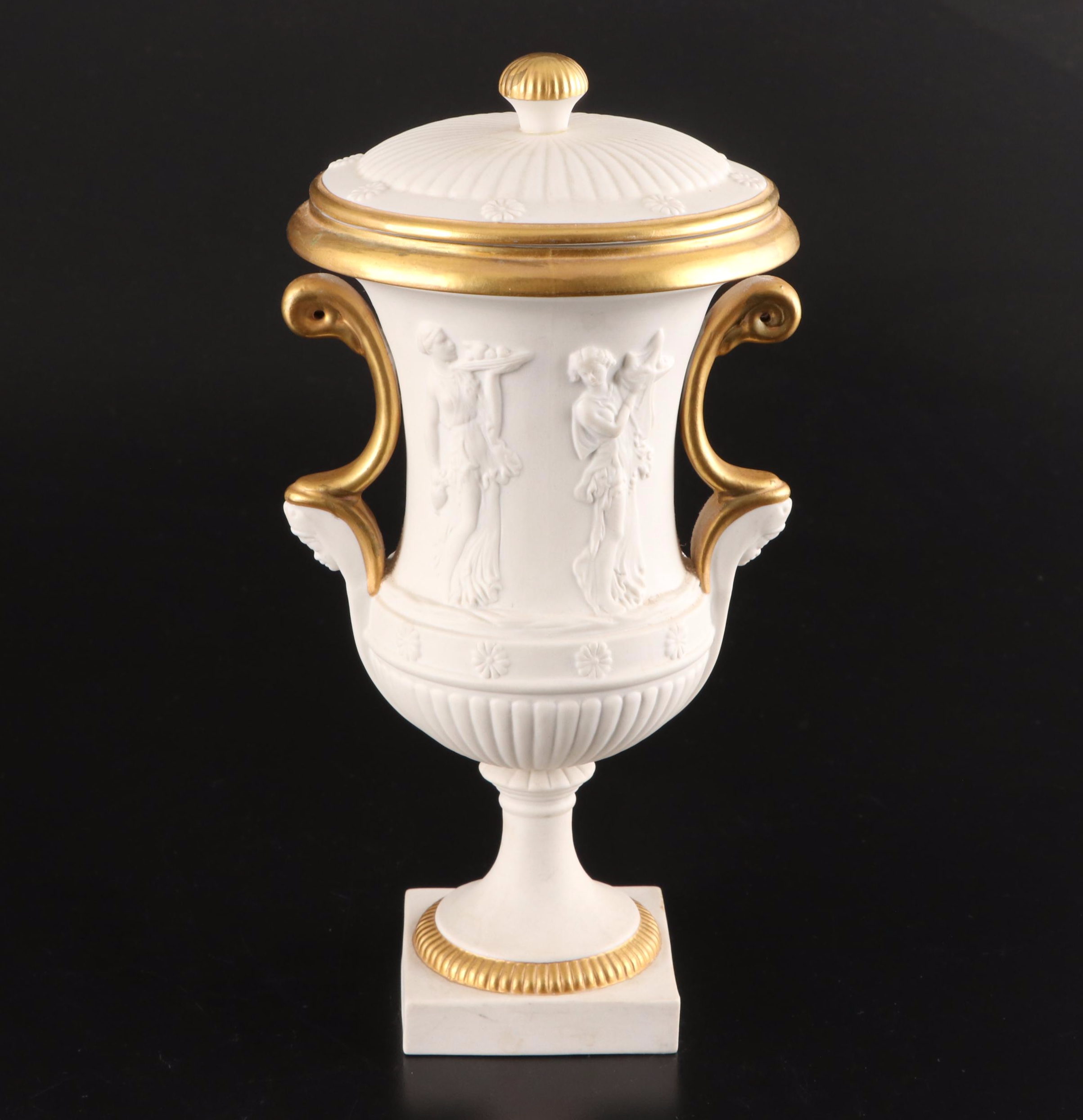 Pair of Italian Neoclassical Style Relief Bisque Porcelain Urns, Mid-20th C.