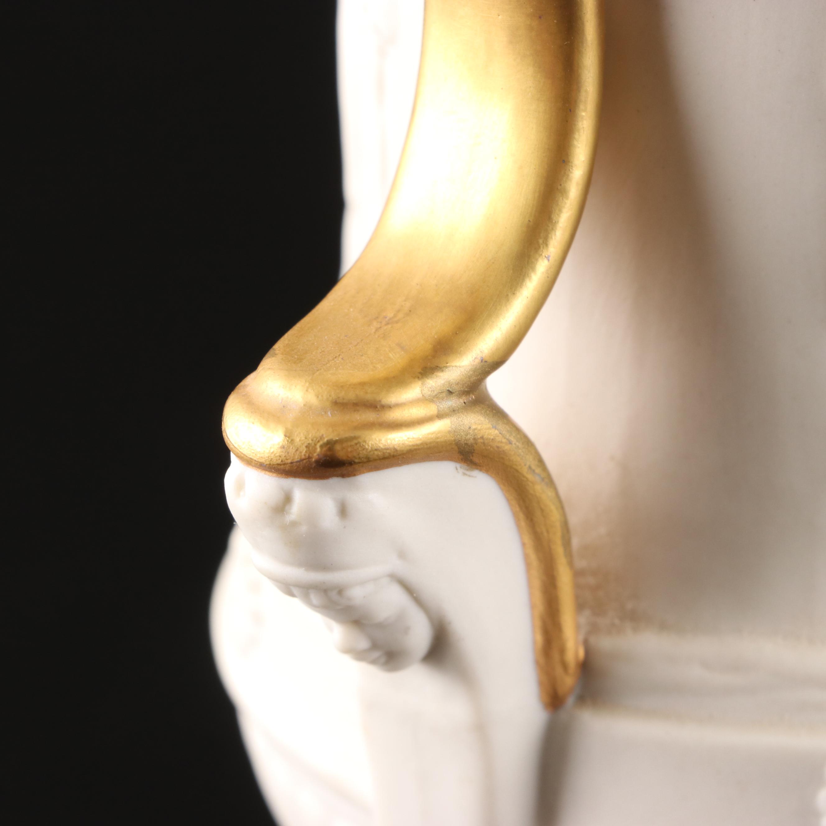 Pair of Italian Neoclassical Style Relief Bisque Porcelain Urns, Mid-20th C.