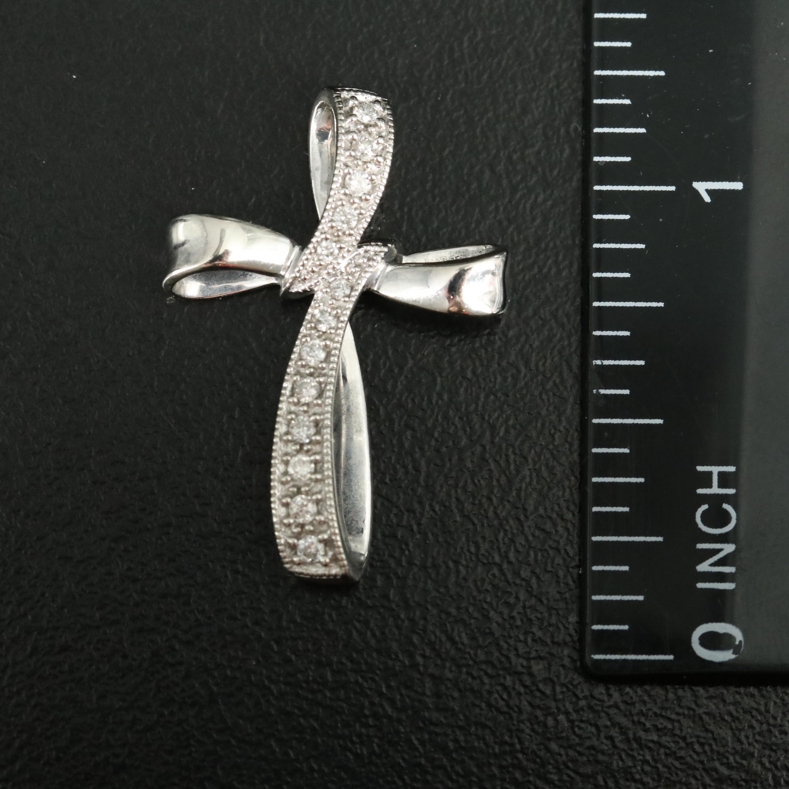 10K 0.14 CTW Diamond Cross Pendant