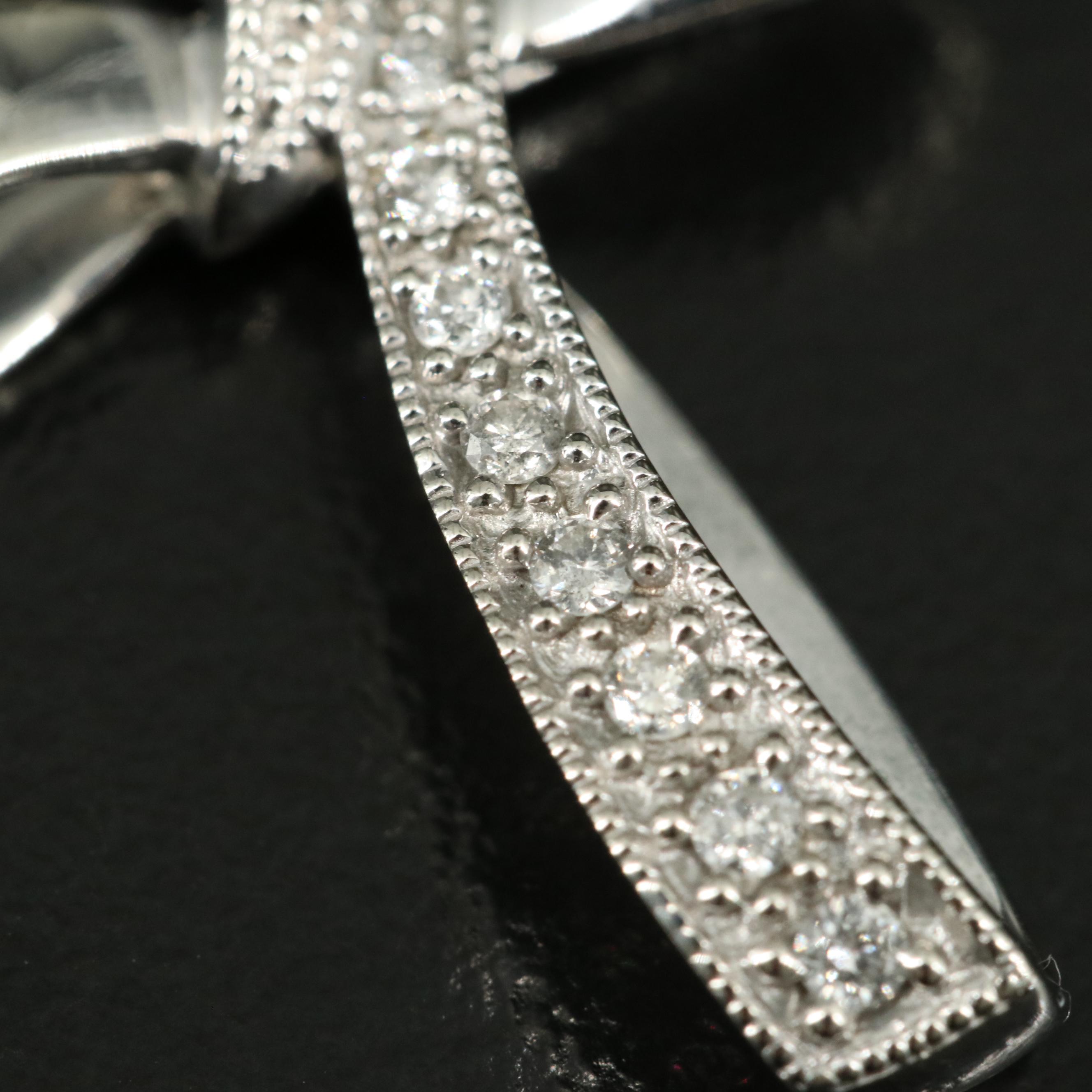 10K 0.14 CTW Diamond Cross Pendant