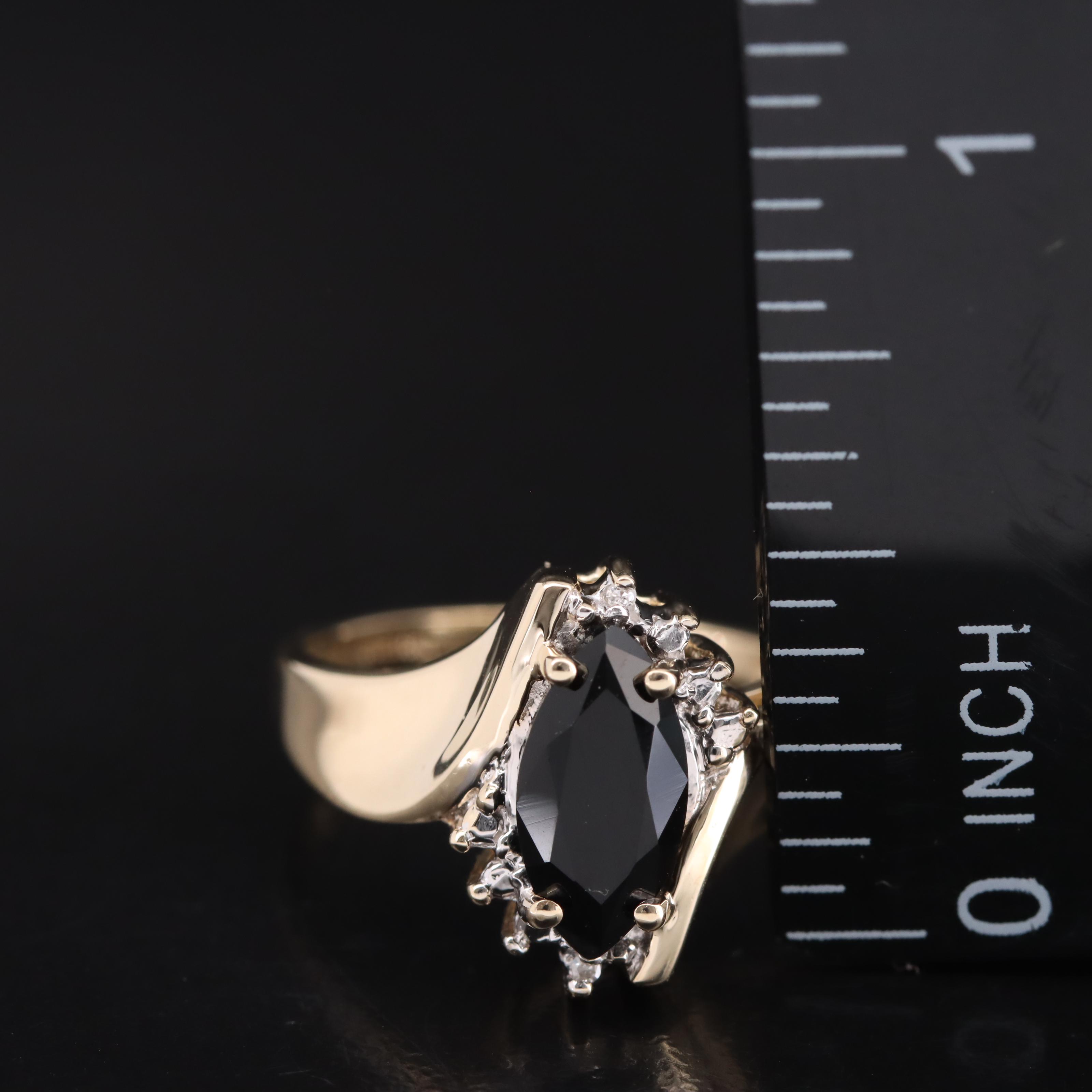 10K Black Onyx and Diamond Bypass Ring
