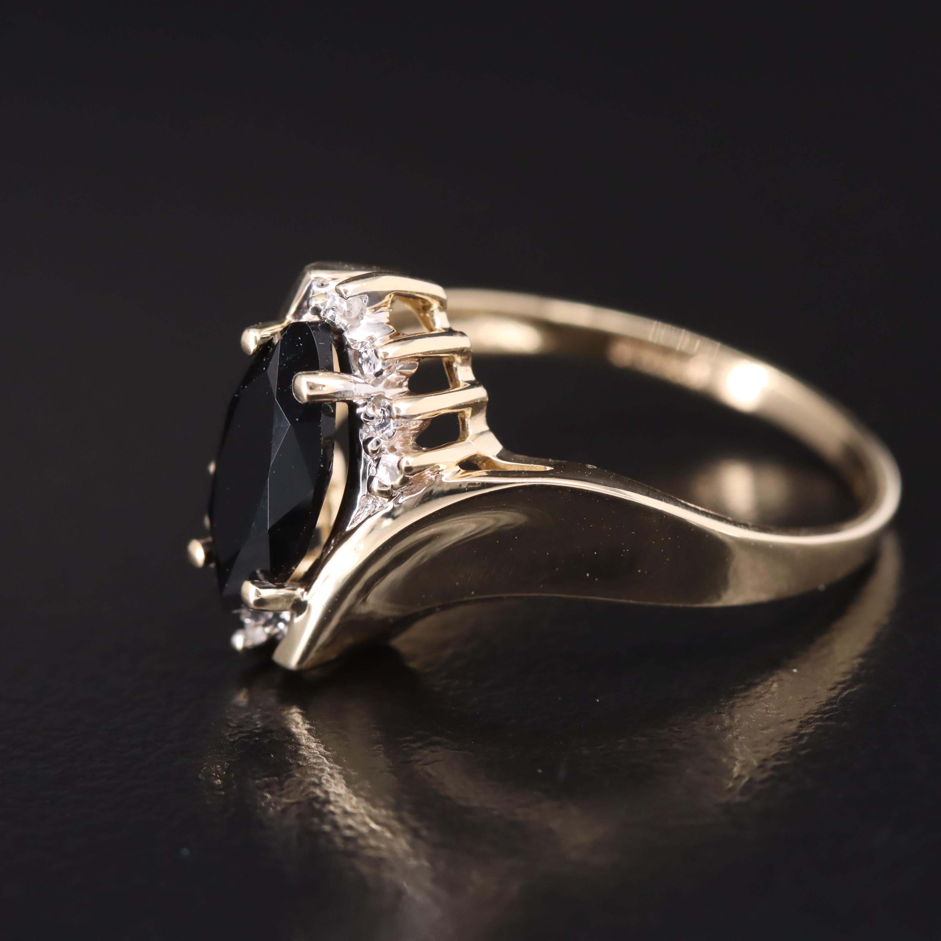 10K Black Onyx and Diamond Bypass Ring