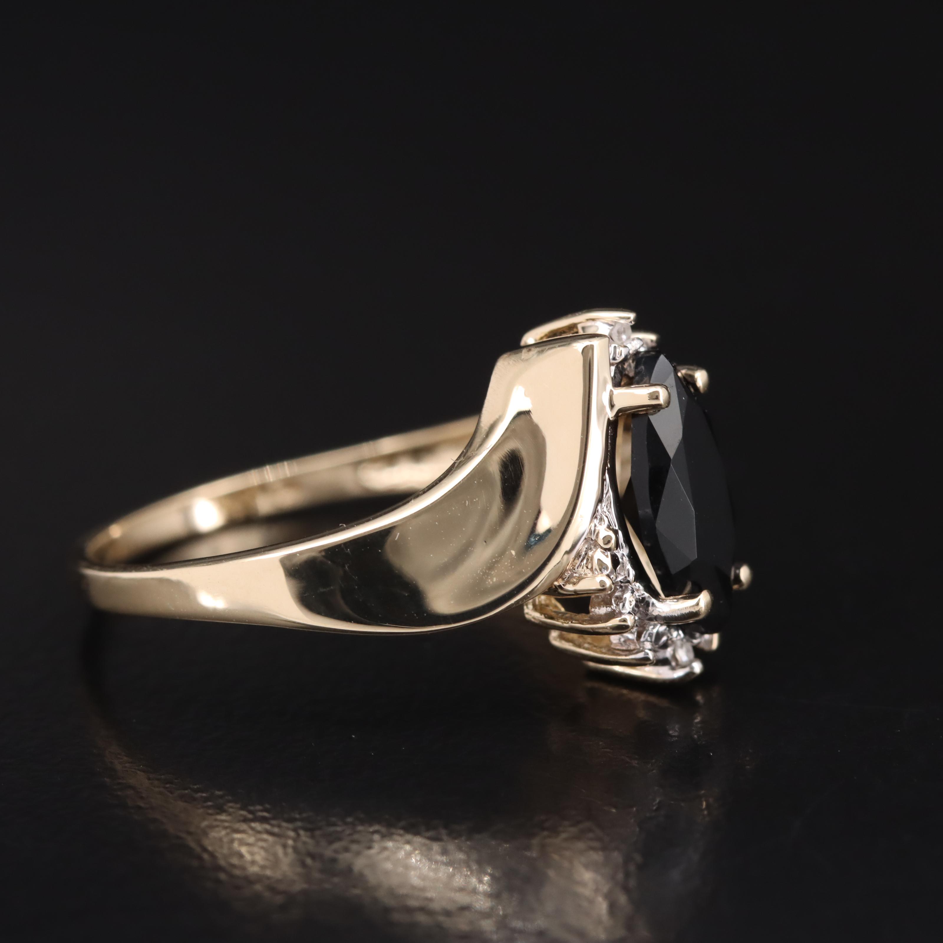 10K Black Onyx and Diamond Bypass Ring