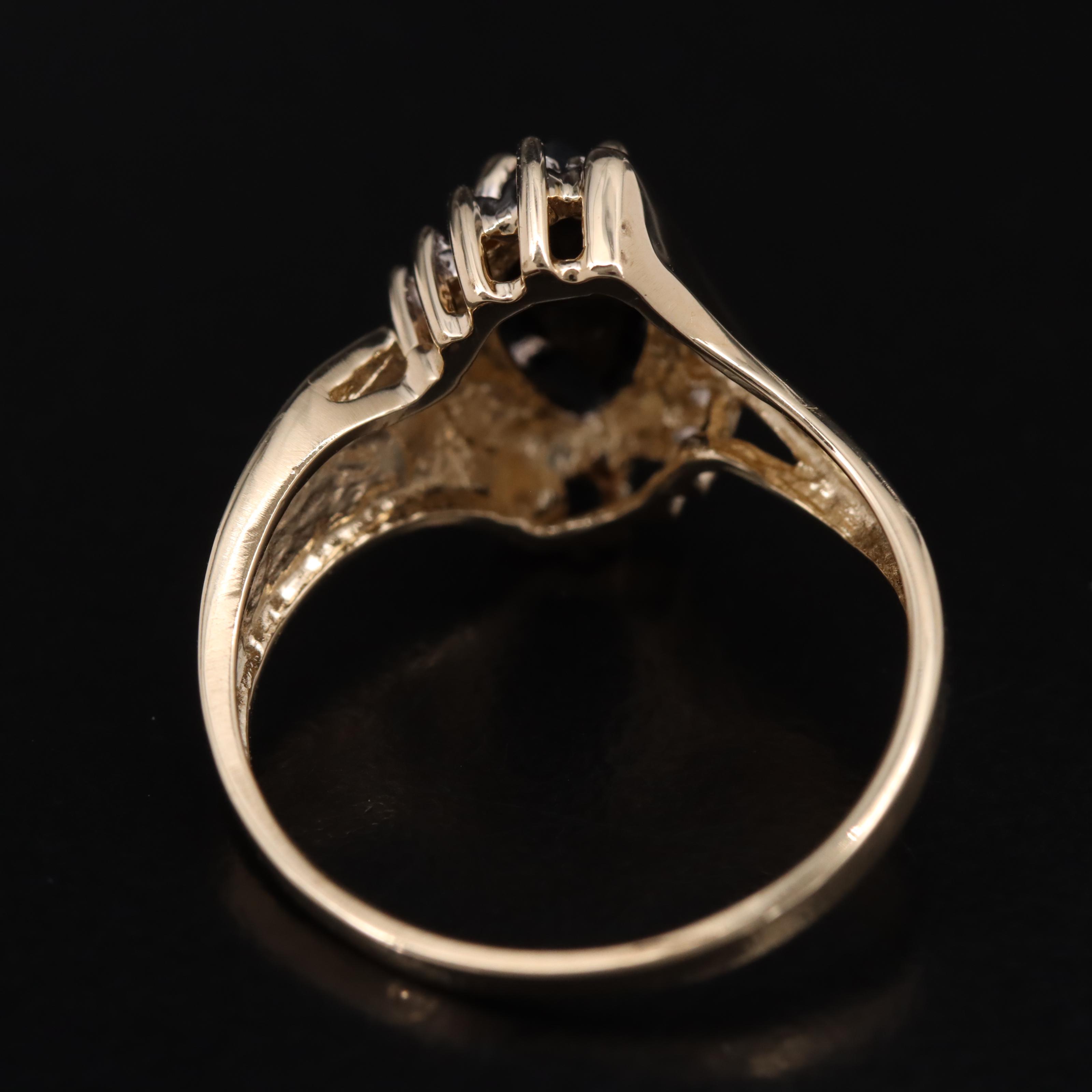 10K Black Onyx and Diamond Bypass Ring