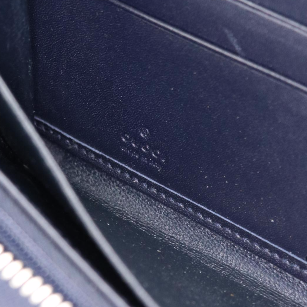 Gucci Leather Zip Wallet