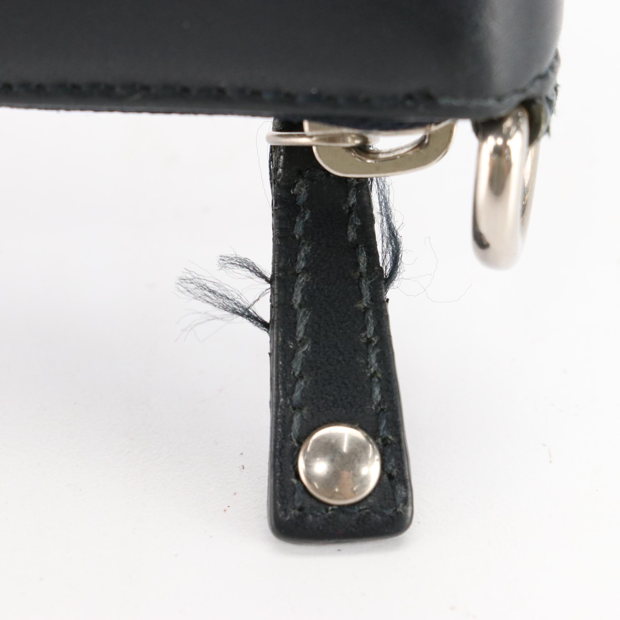 Gucci Leather Zip Wallet