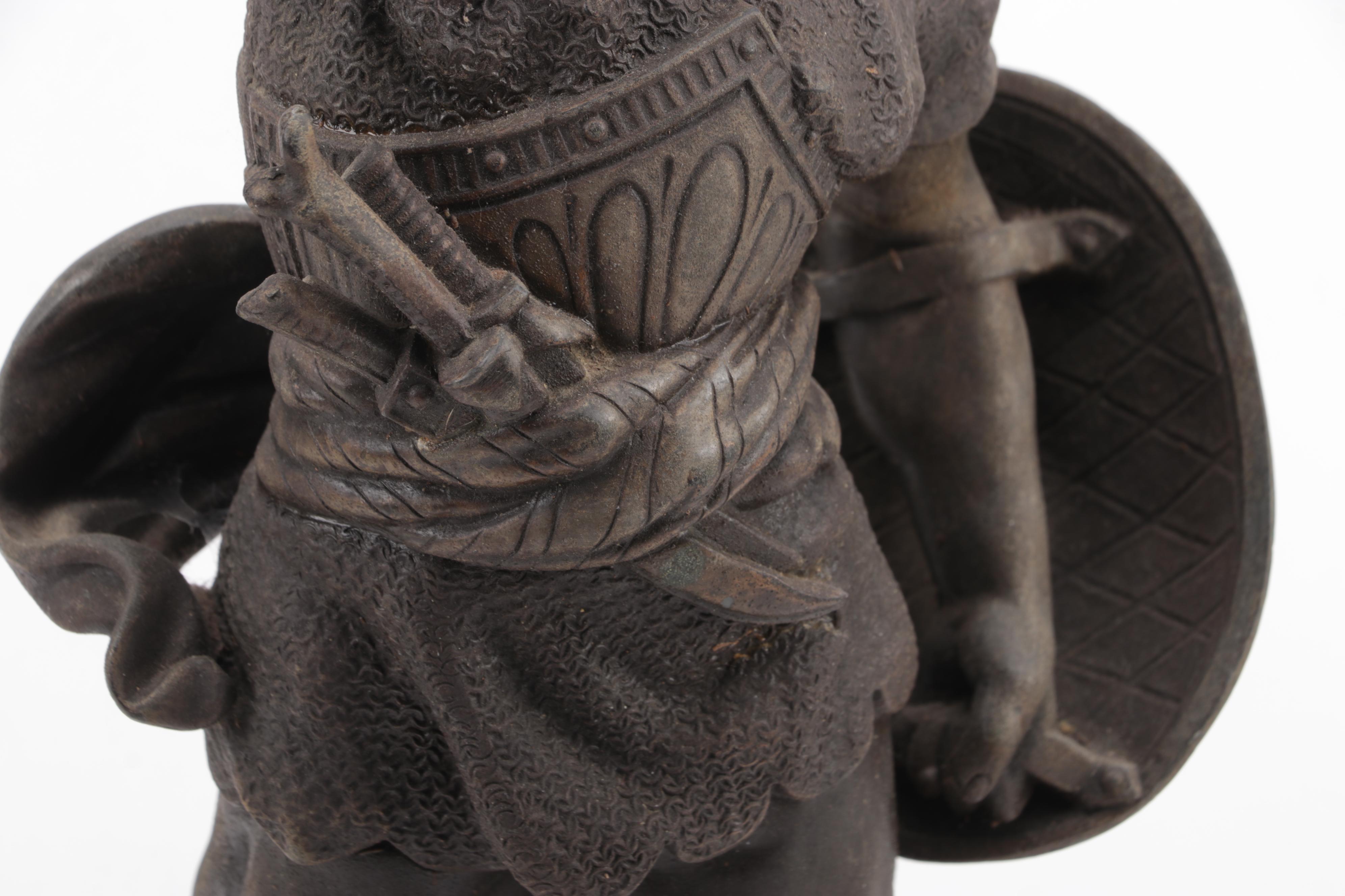 Cast Metal Sculpture of a Warrior Woth Shield and Weapon