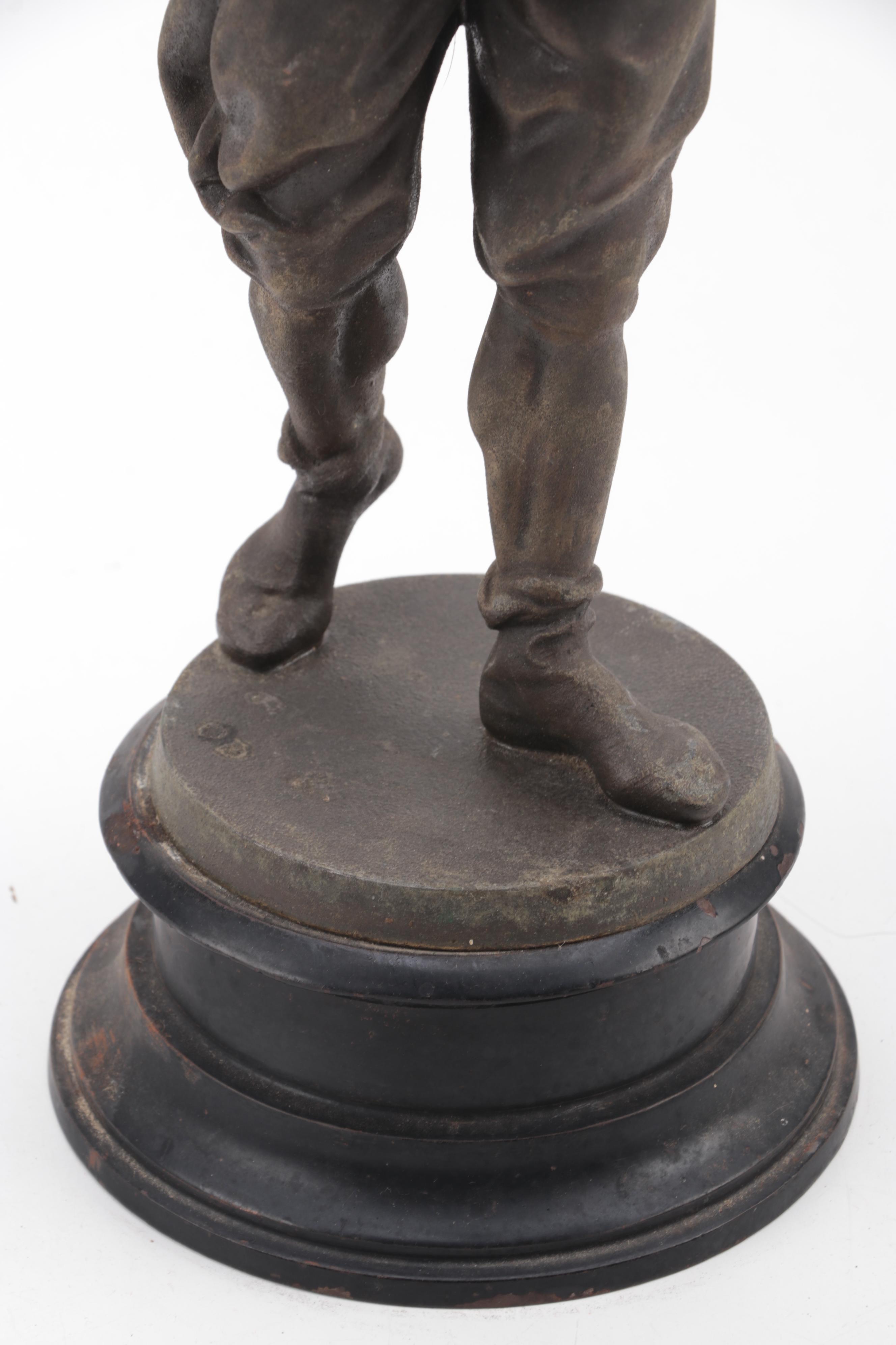 Cast Metal Sculpture of a Warrior Woth Shield and Weapon