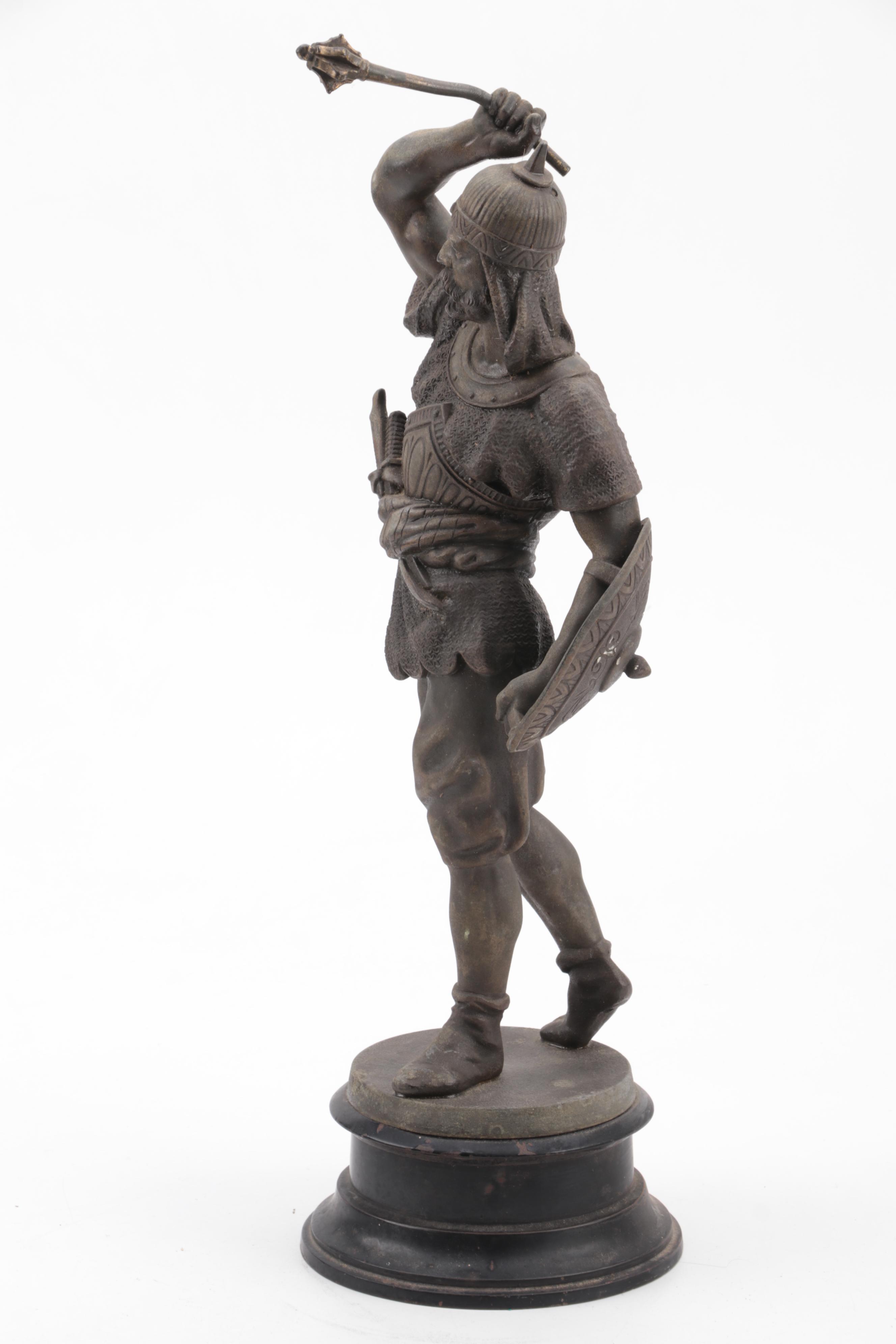 Cast Metal Sculpture of a Warrior Woth Shield and Weapon