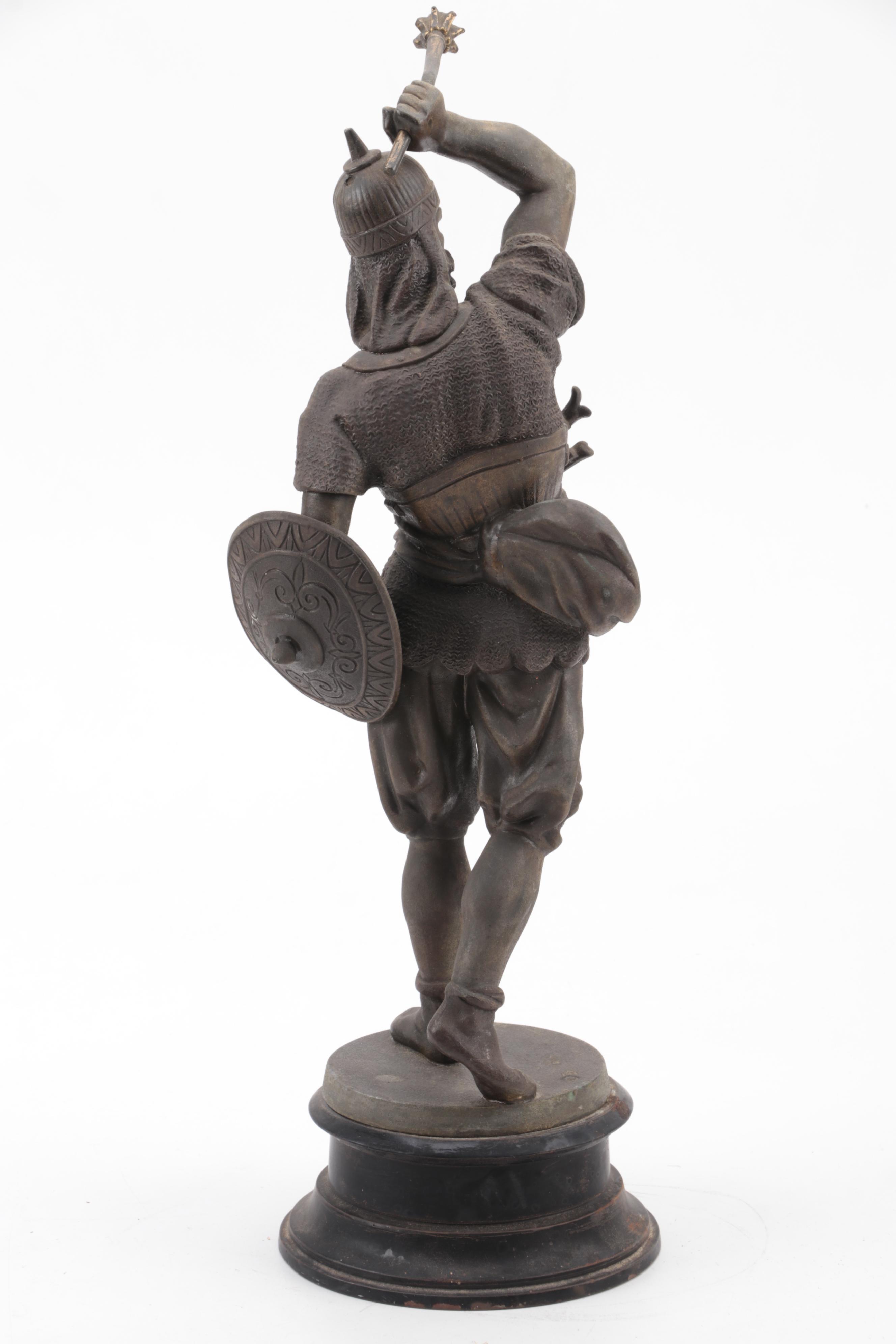 Cast Metal Sculpture of a Warrior Woth Shield and Weapon
