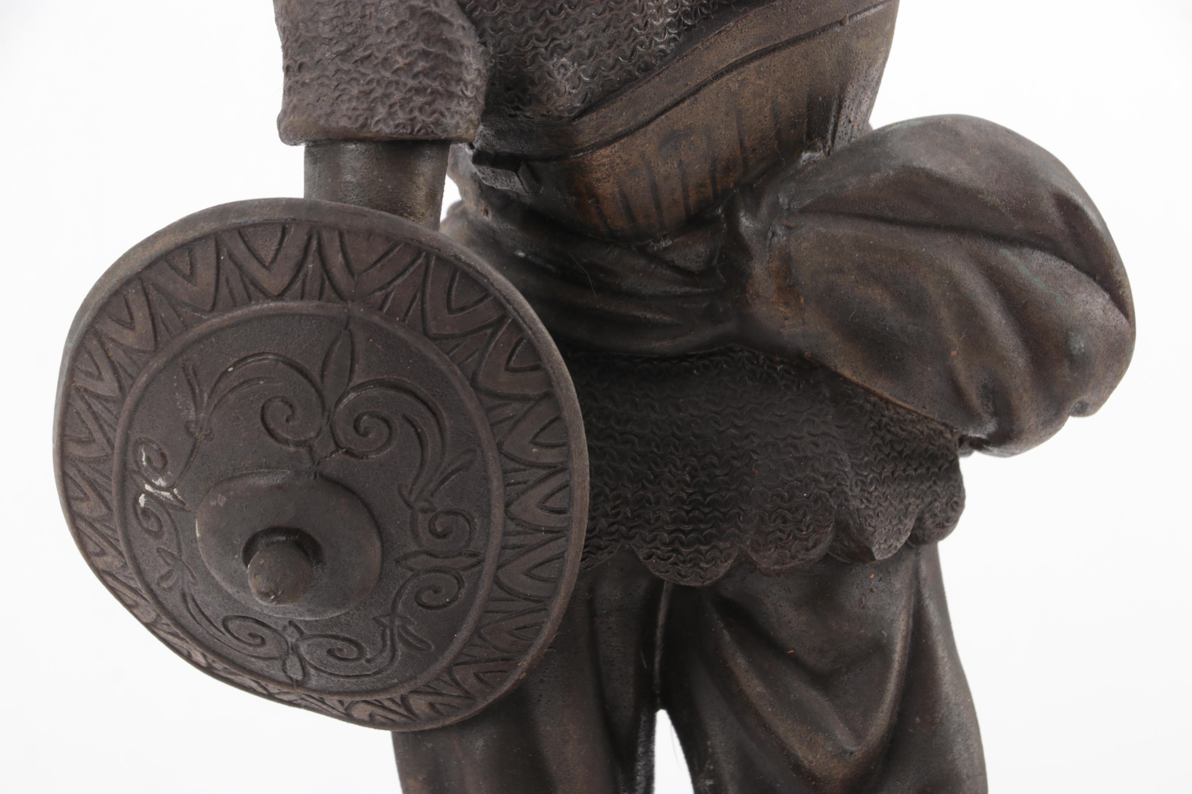 Cast Metal Sculpture of a Warrior Woth Shield and Weapon