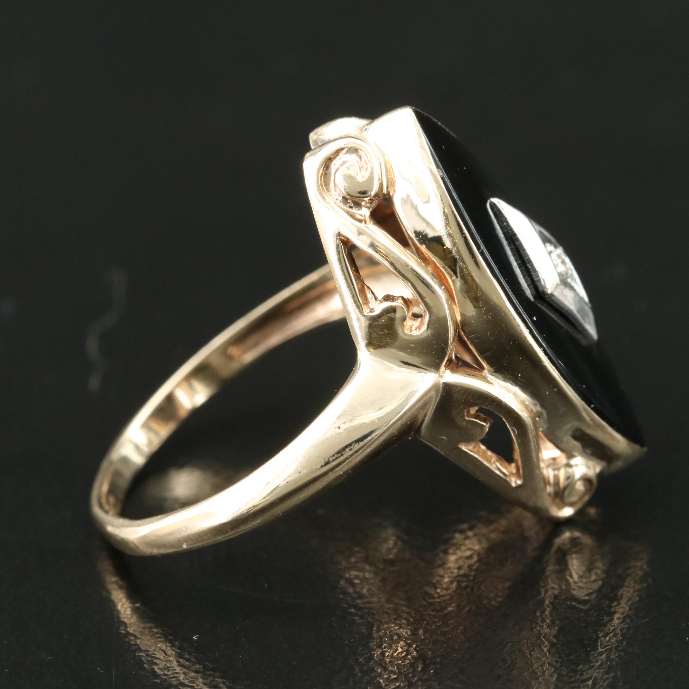 10K Black Onyx and Diamond Navette Ring