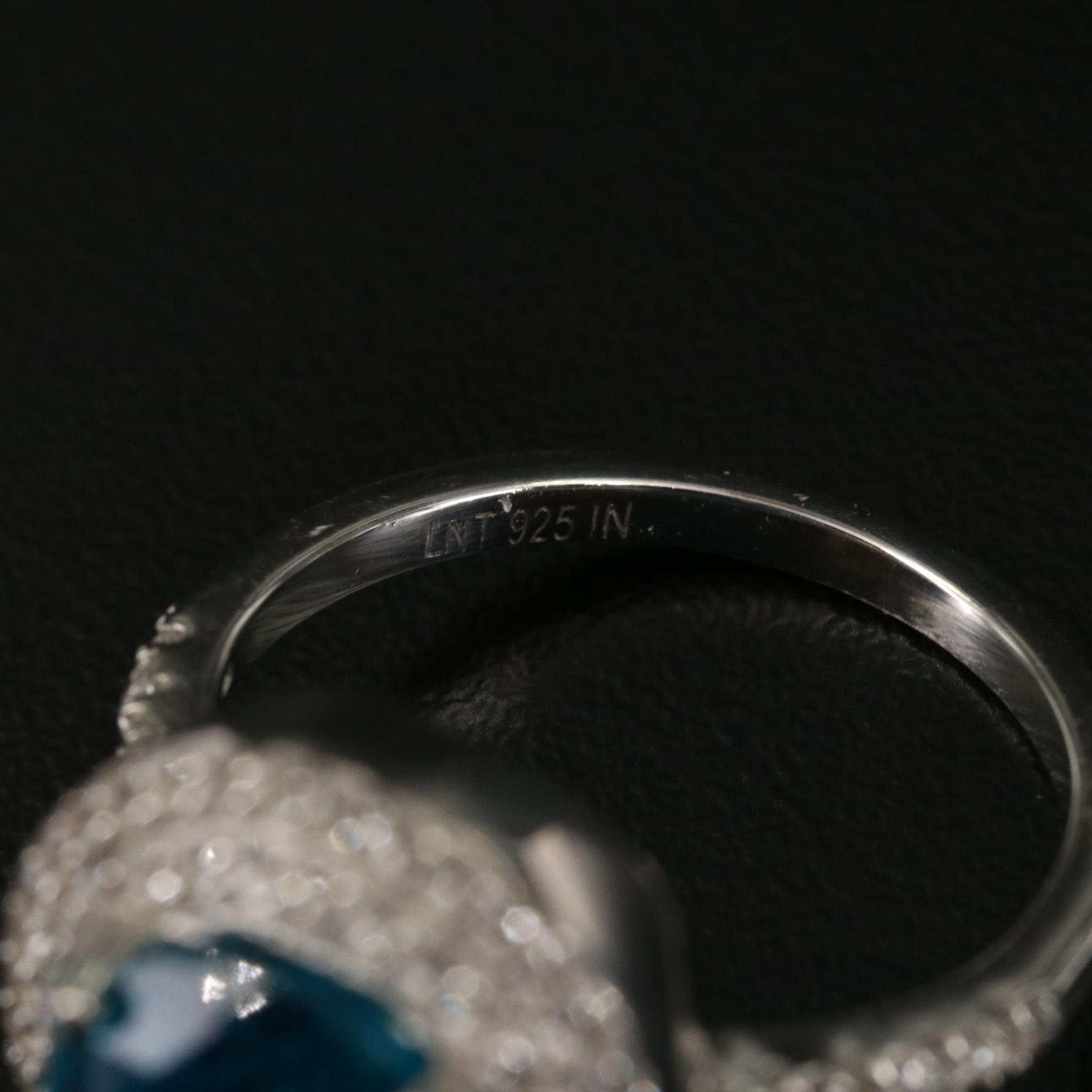 Sterling Topaz Oval Halo Ring