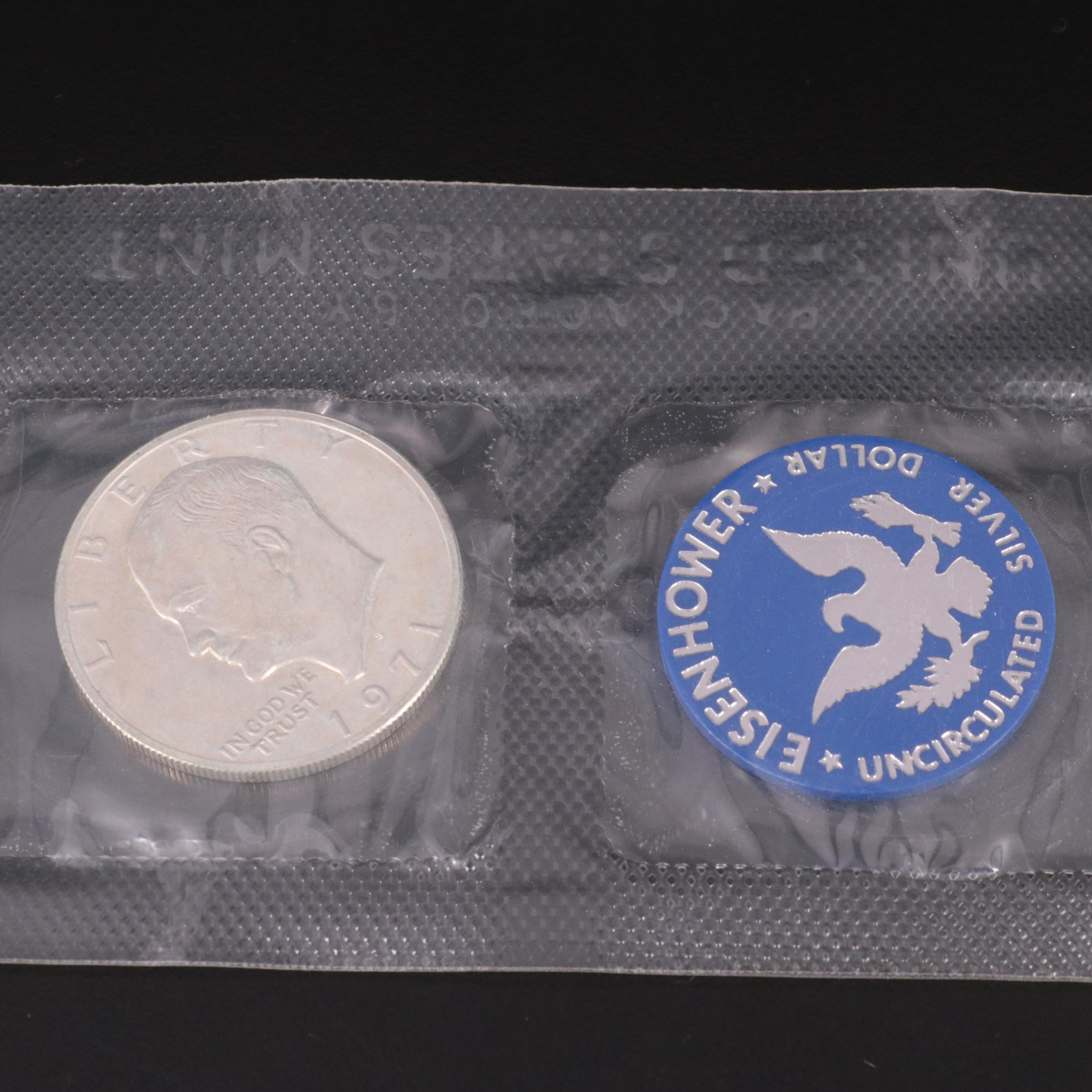 Two Statue of Liberty Commemorative Coin Sets and an Eisenhower Silver Dollar