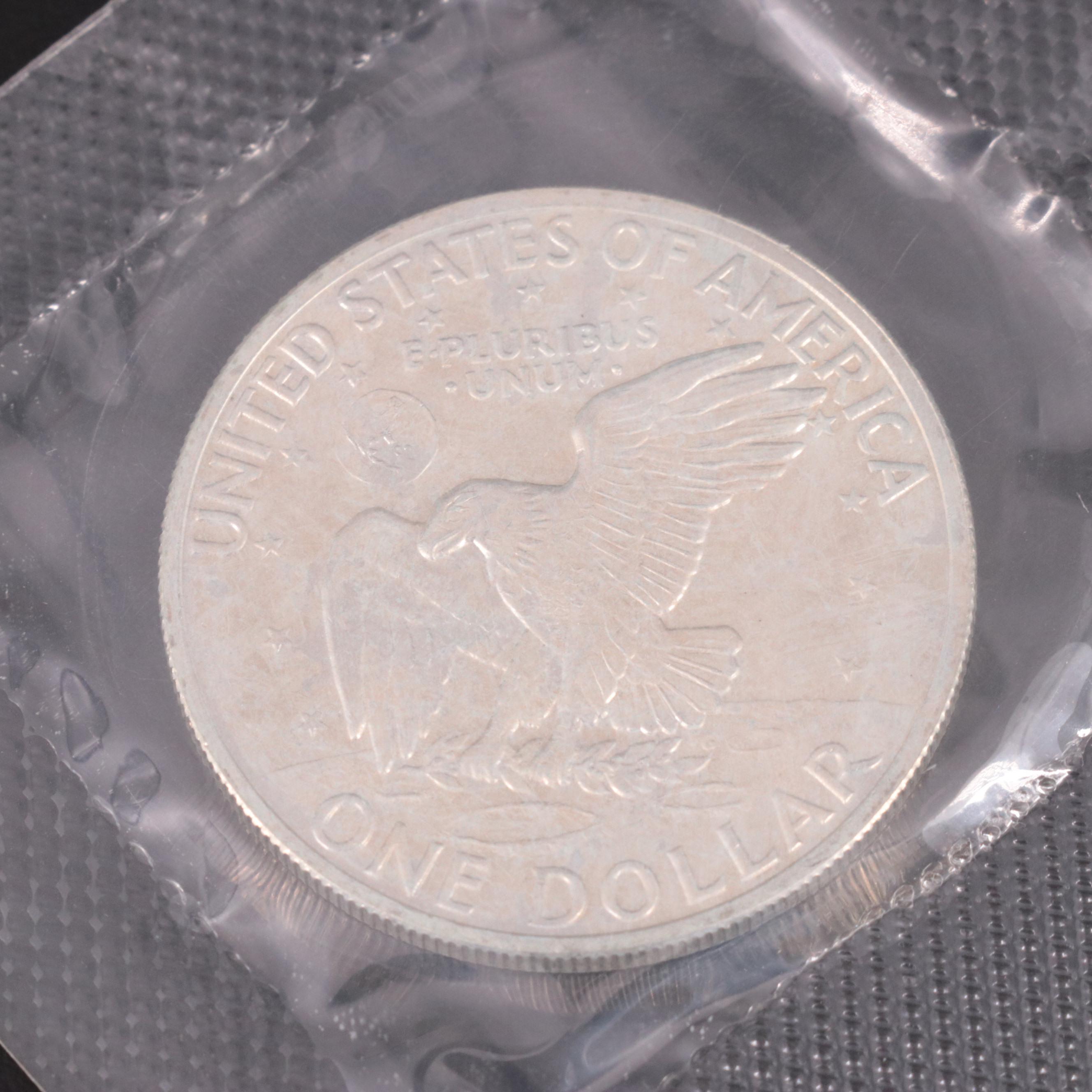 Two Statue of Liberty Commemorative Coin Sets and an Eisenhower Silver Dollar