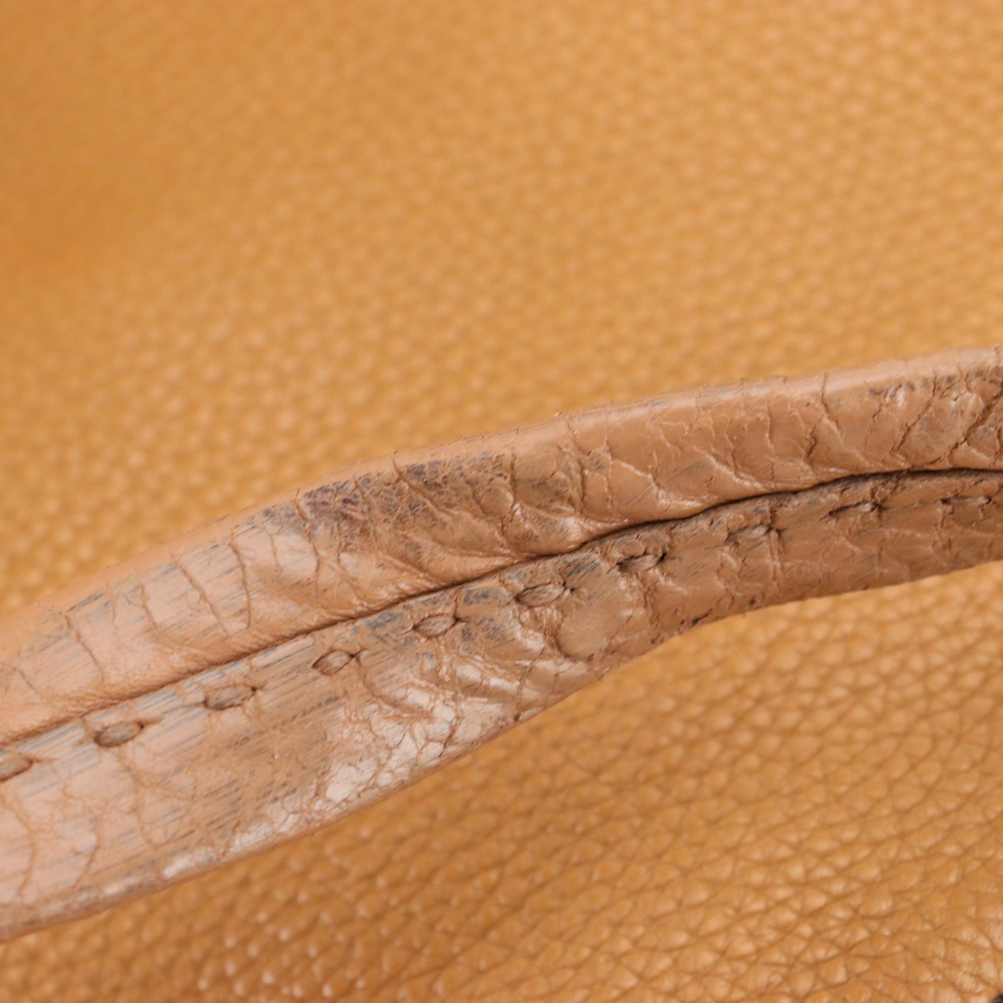 Prada Shoulder Bag in Brown Pebbled Leather with Oversized Clasp Hardware