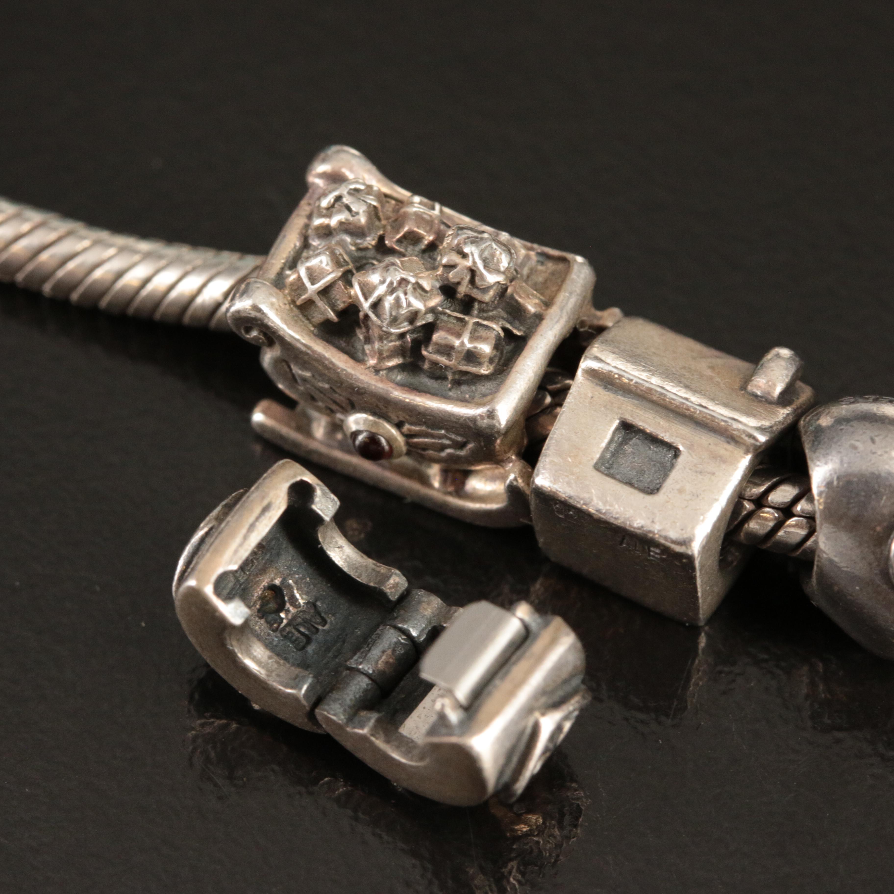 Pandora Sterling Charm Bracelet Including Dinosaur, Fish and Santa's Sleigh