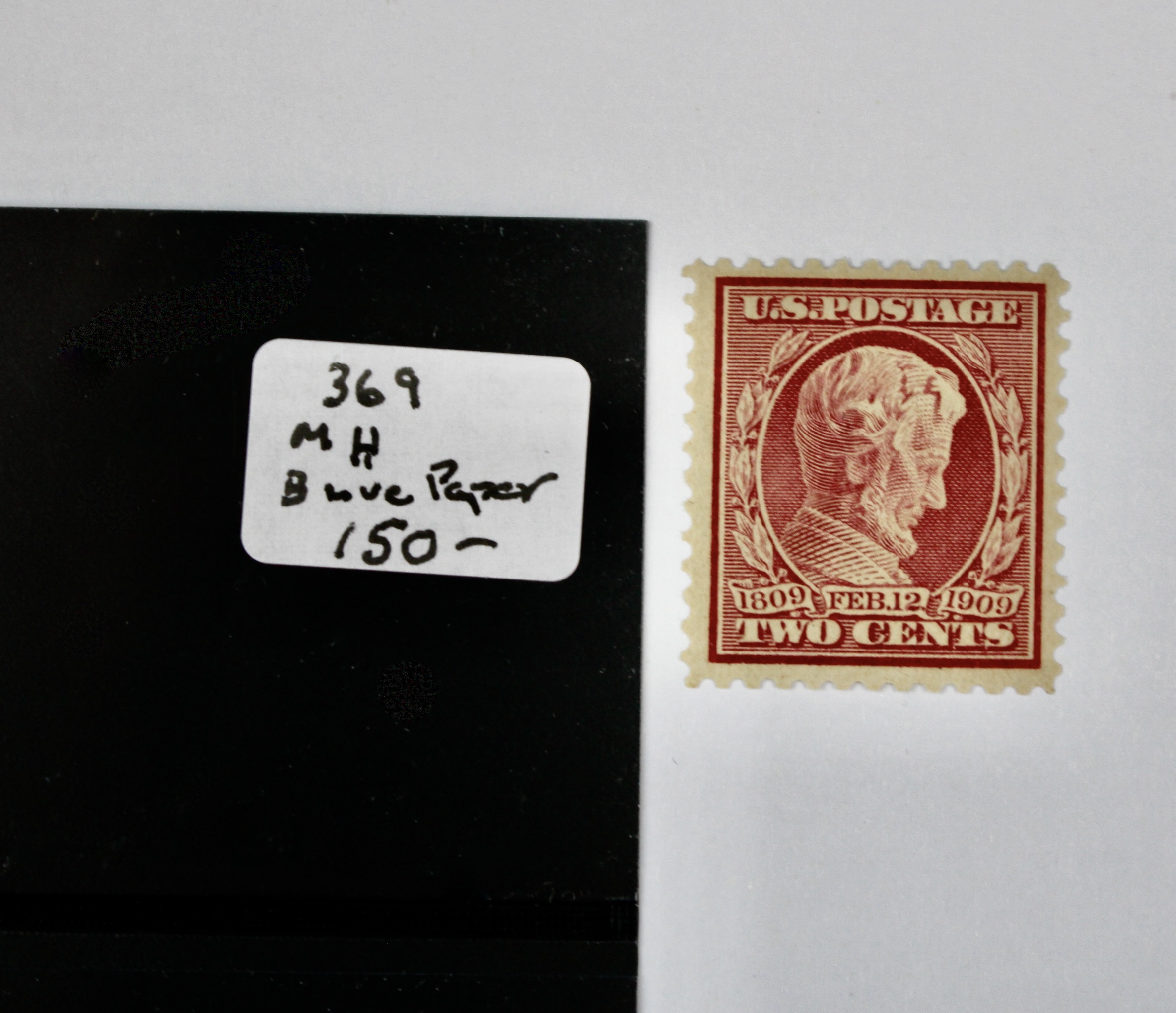 Three Earlier Mint and Mint Never Hinged U.S. Postage Stamps