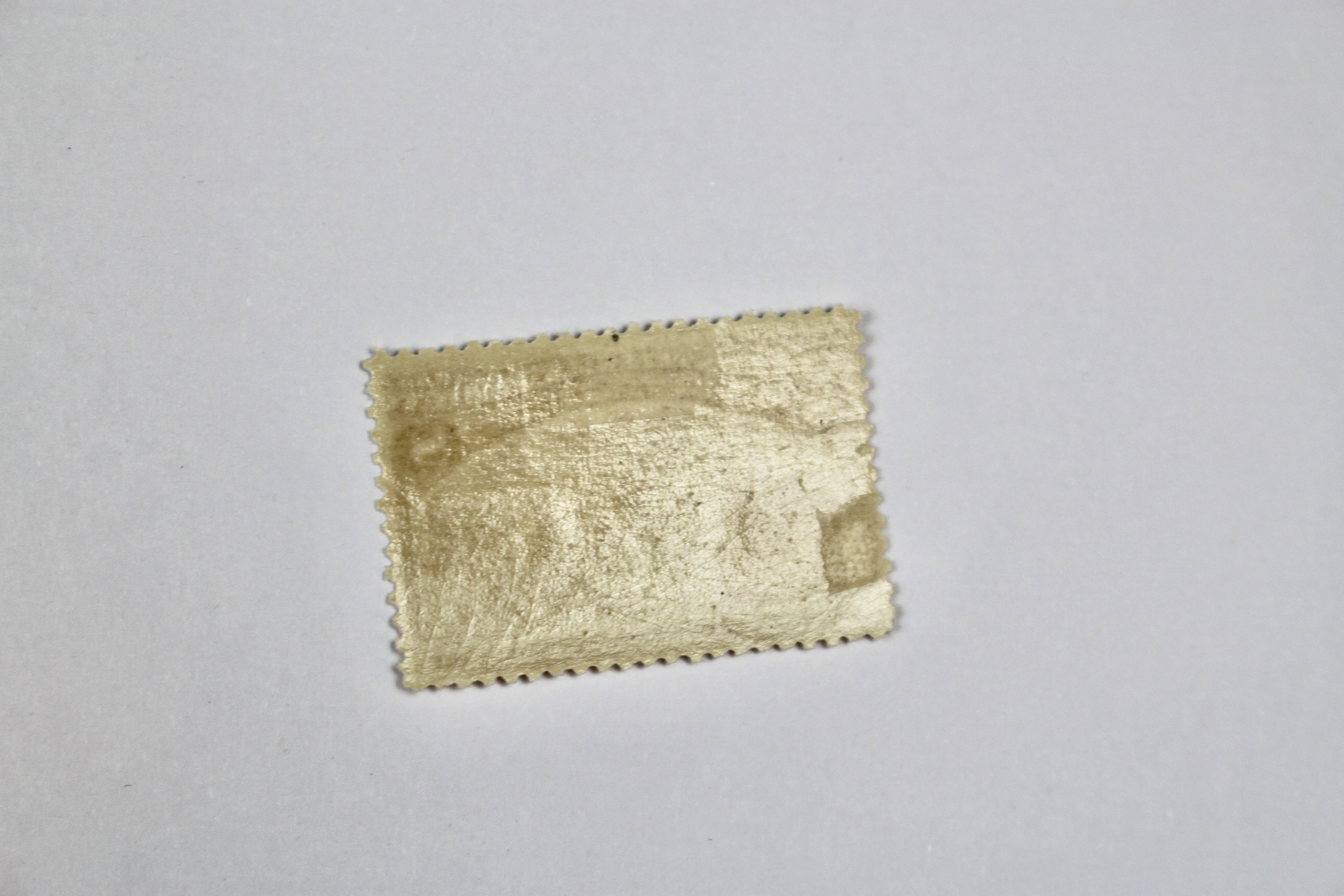 Three Earlier Mint and Mint Never Hinged U.S. Postage Stamps