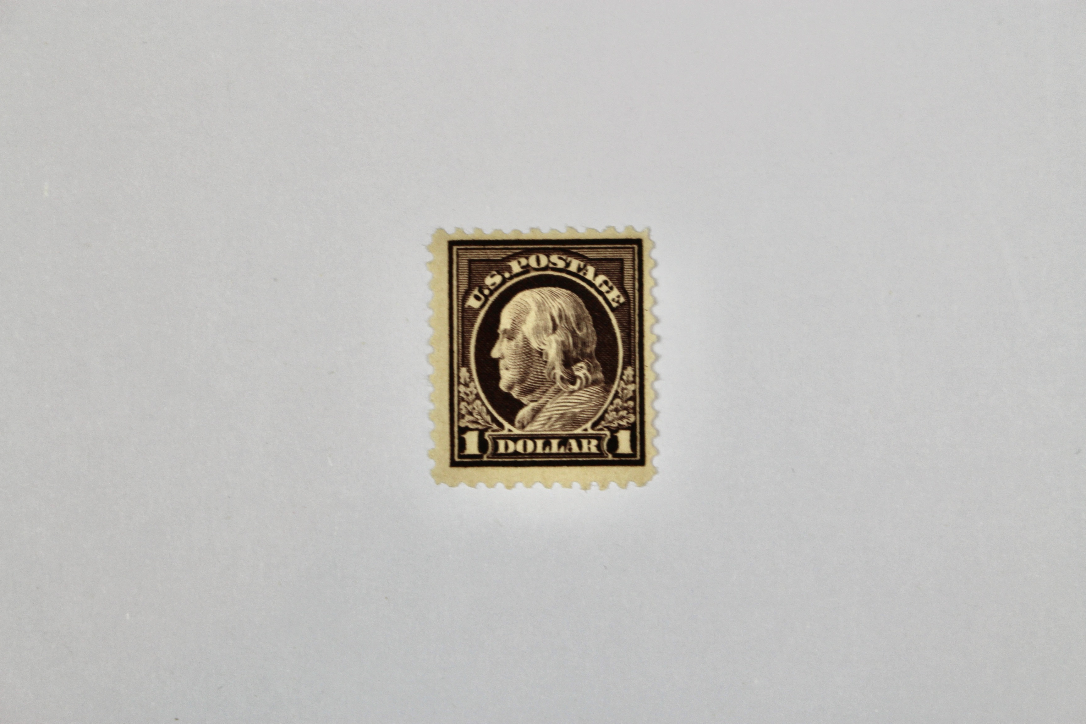 Three Earlier Mint and Mint Never Hinged U.S. Postage Stamps