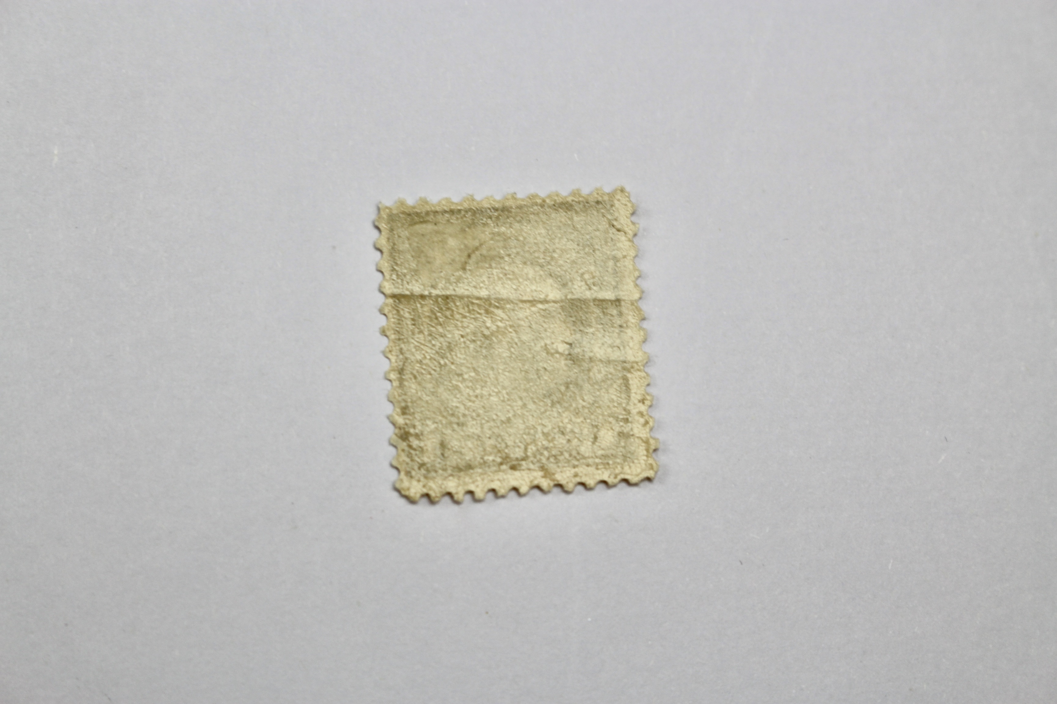 Three Earlier Mint and Mint Never Hinged U.S. Postage Stamps