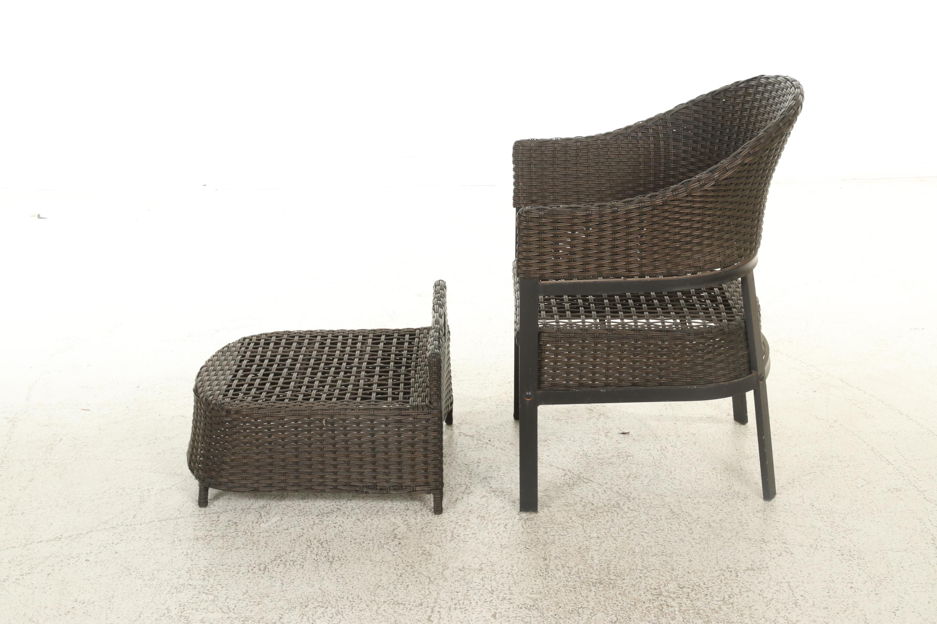 Two Contemporary Resin Wicker Patio Chairs and Ottomans With Accent Table