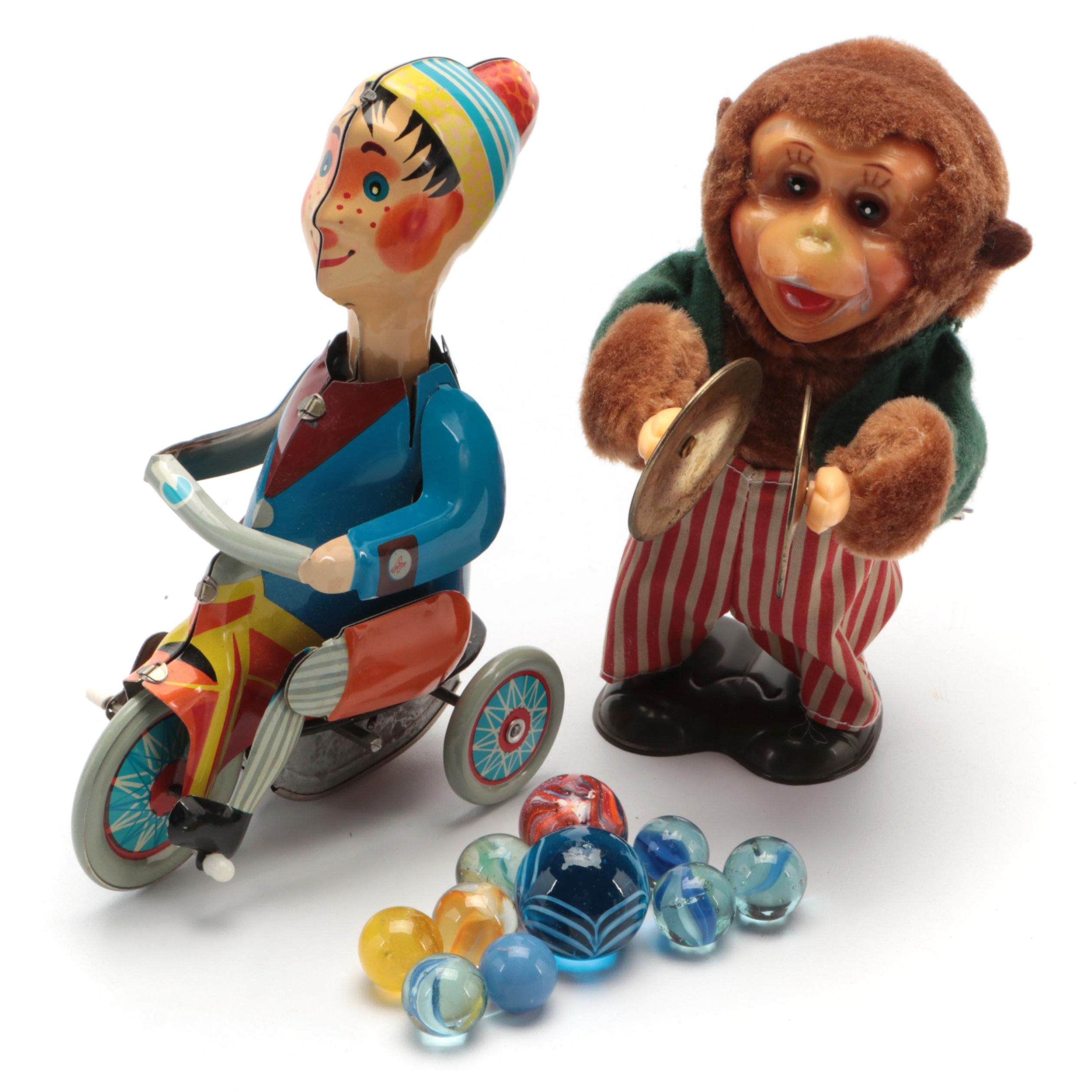 Tin Lithograph Tricycle Boy, Cymbal Monkey and Glass Marbles