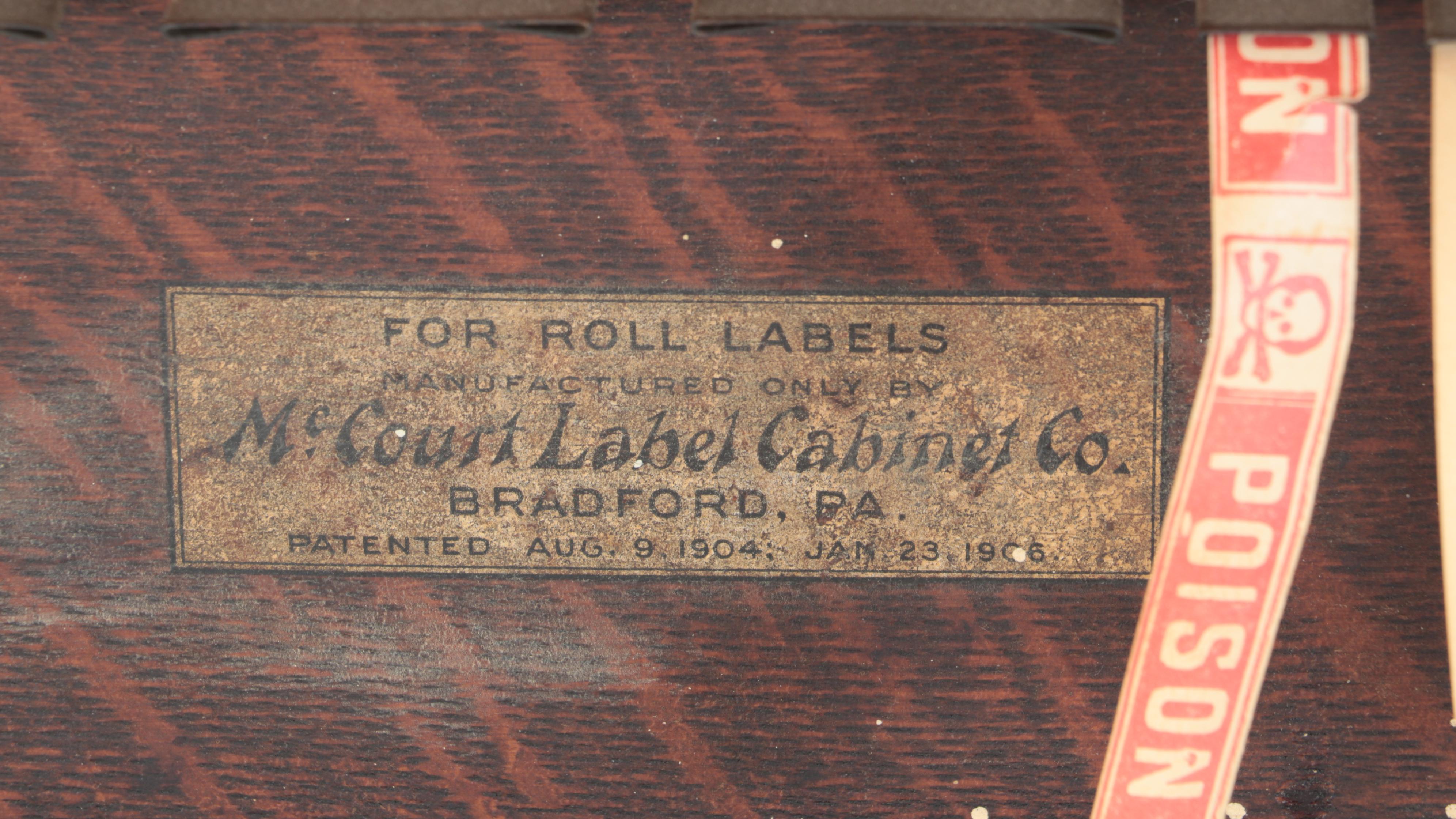 McCourt Oak Label Dispenser with Apothecary Labels, Early 20th Century