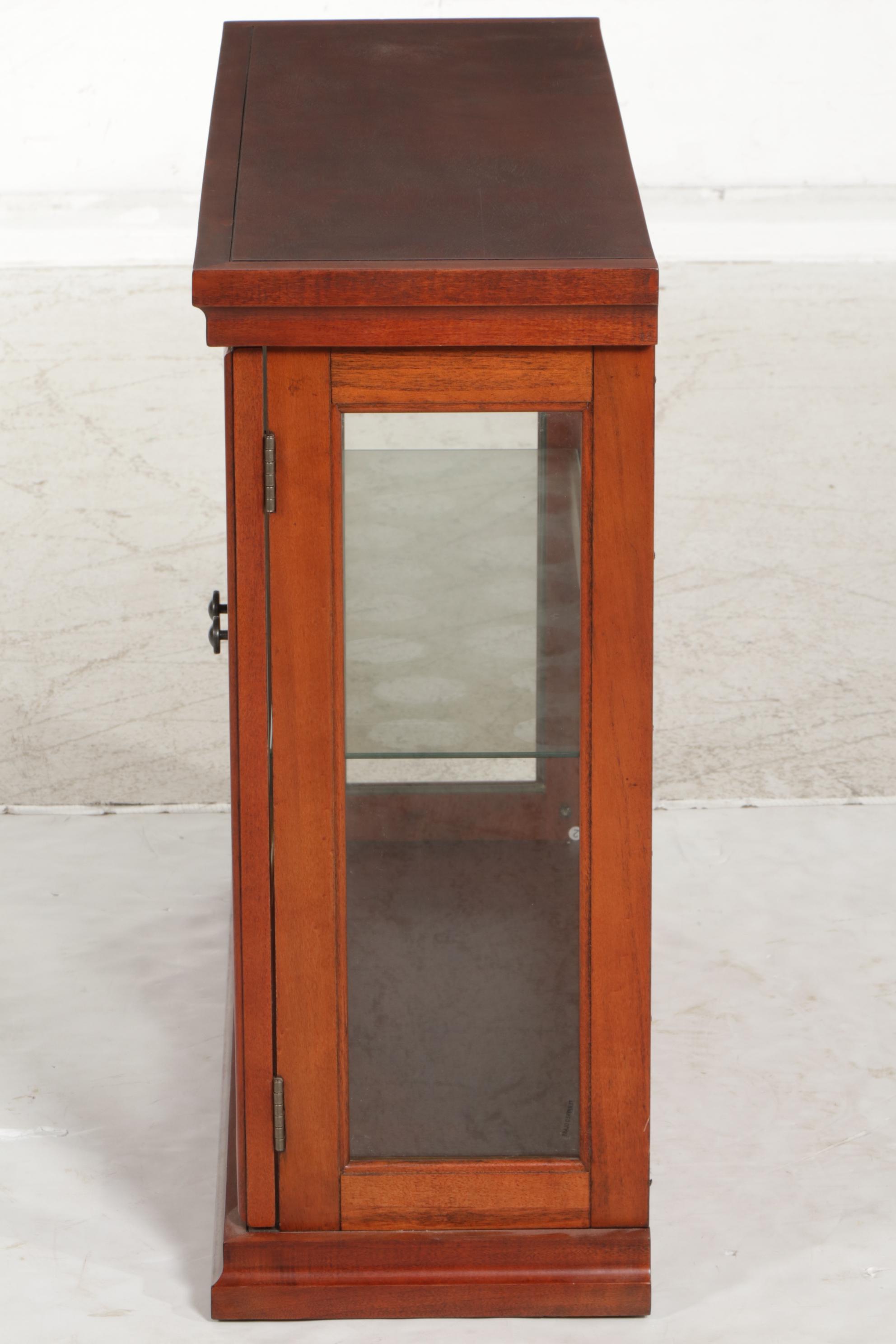 Mirrored Back Walnut Finished Glass Front Display Cabinet